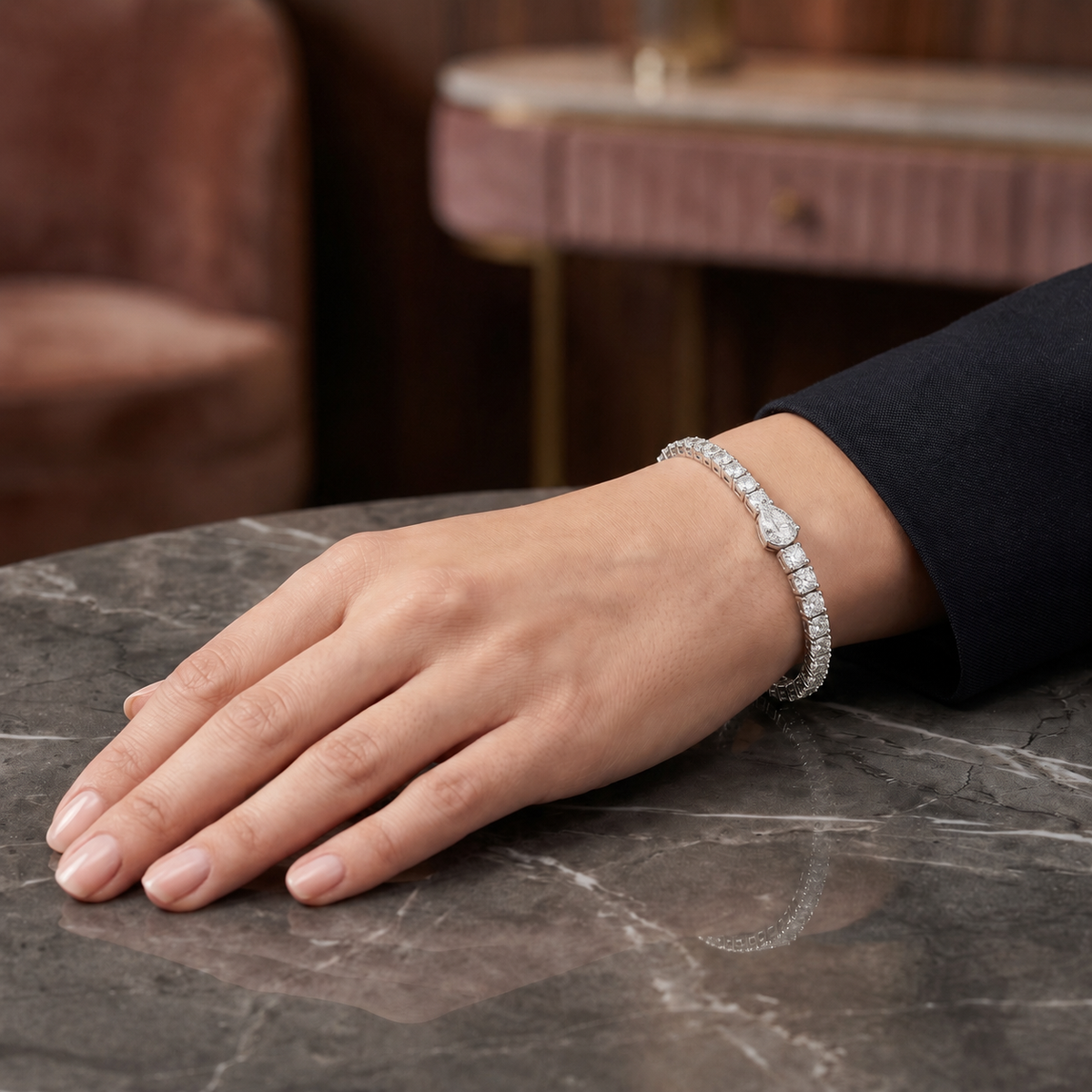 Round Diamond Tennis Bracelet with Pear Centre
