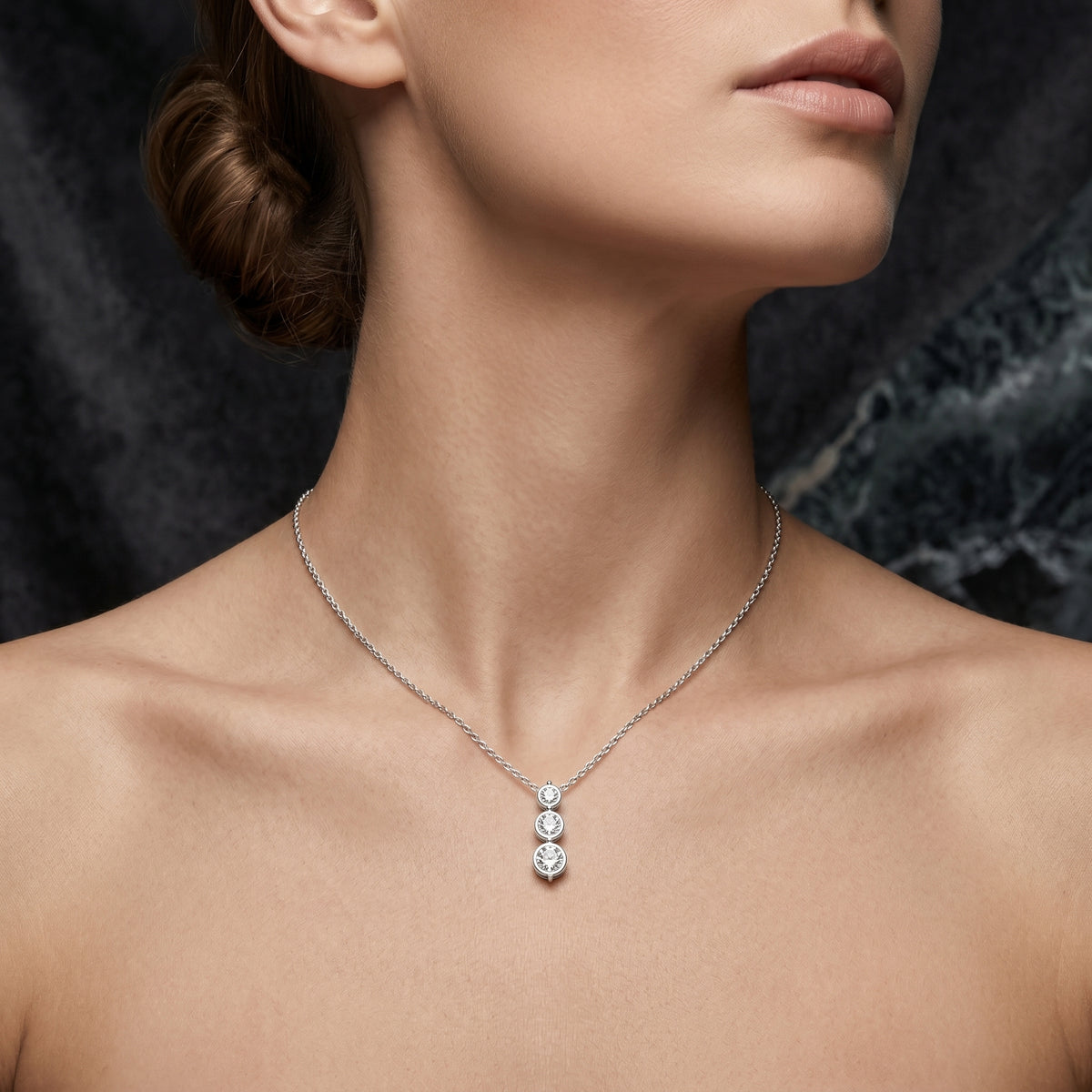 Graduated Three Stone Round Diamond Drop Pendant