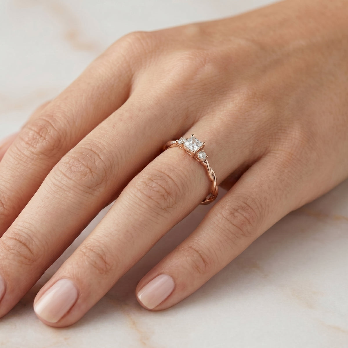 Princess Cut Three Stone Engagement Ring with Round Sides and Twisted Vine Pavé Band — lifestyle