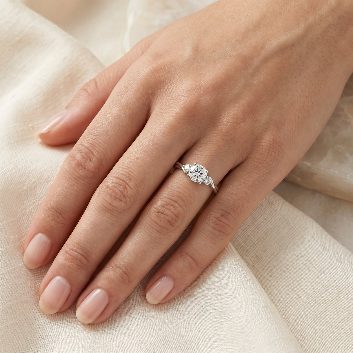 Round Diamond Three Stone Engagement Ring with Bypass Shank — lifestyle