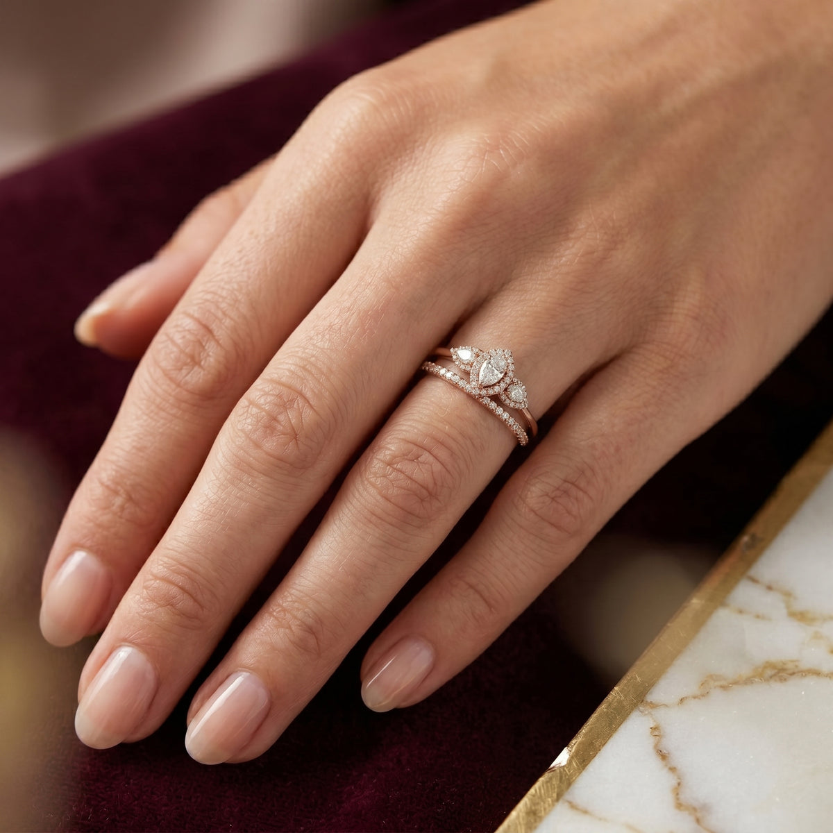 Pear Diamond Three Stone Halo Engagement Ring with Pear Halo Sides and Pavé Band — lifestyle