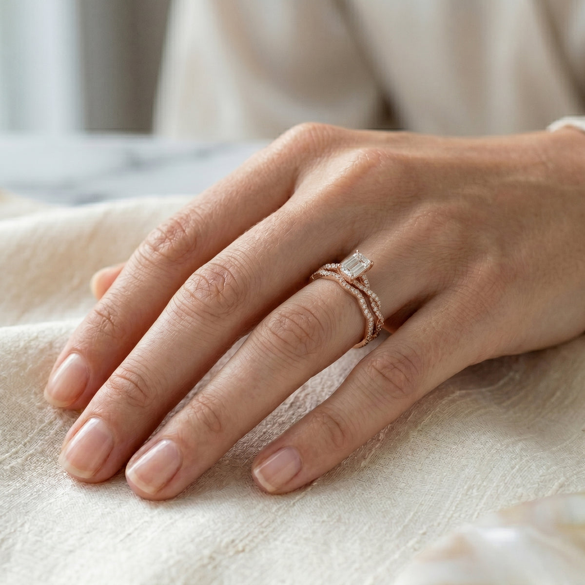 Emerald Cut Engagement Ring with Triple Row Pavé Band