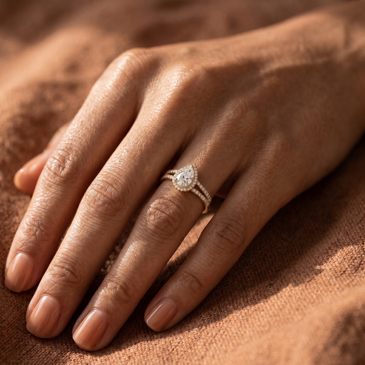 Pear Diamond Halo Engagement Ring with Split Shank Pavé Band