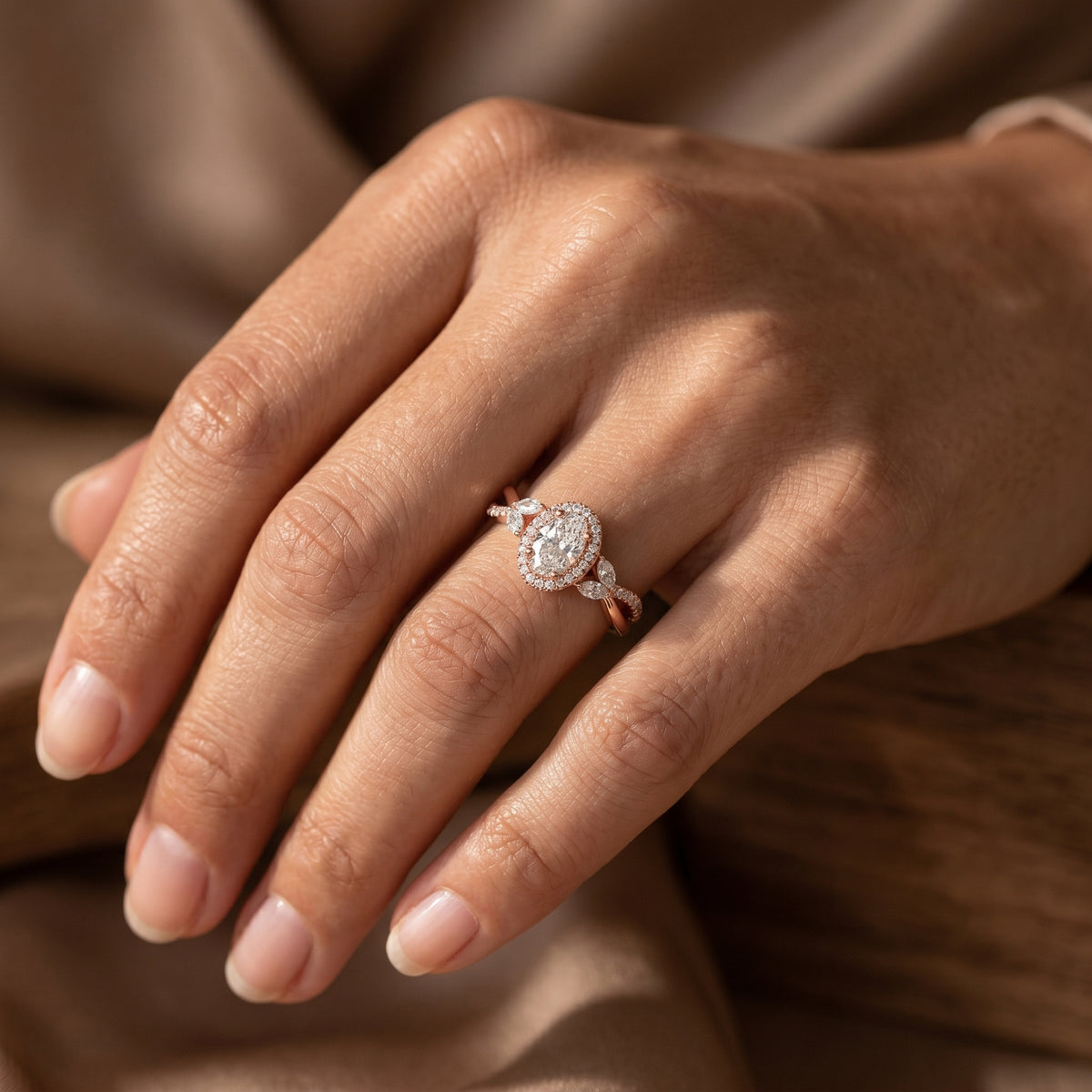 Oval Diamond Halo Engagement Ring with Leaf Side Accents and Twisted Band — lifestyle