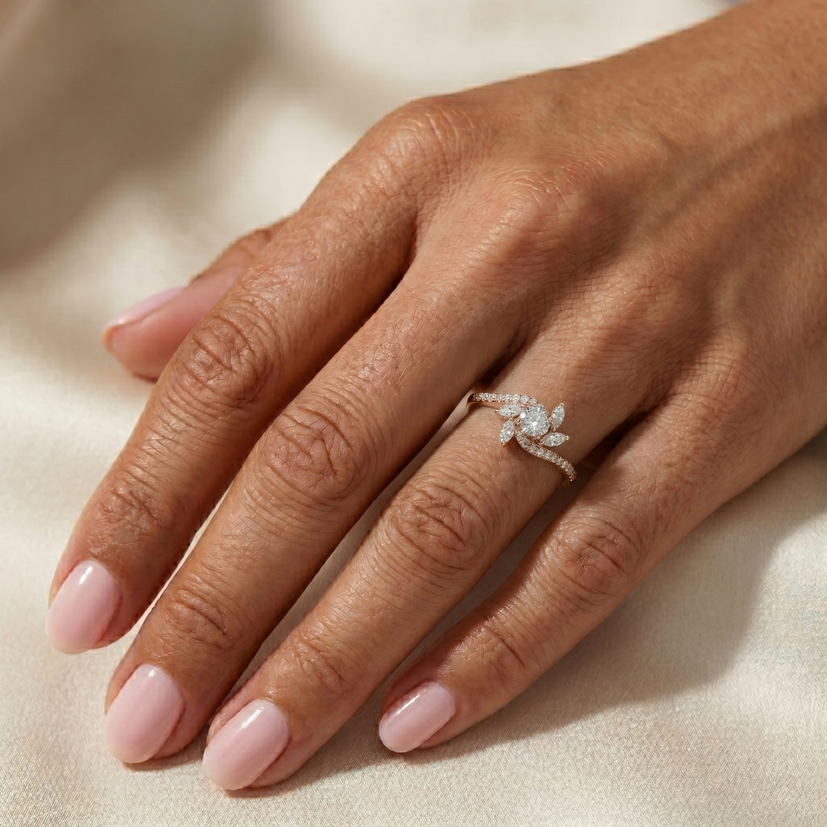 Round Diamond Engagement Ring with Marquise Side Accents and Bypass Shank