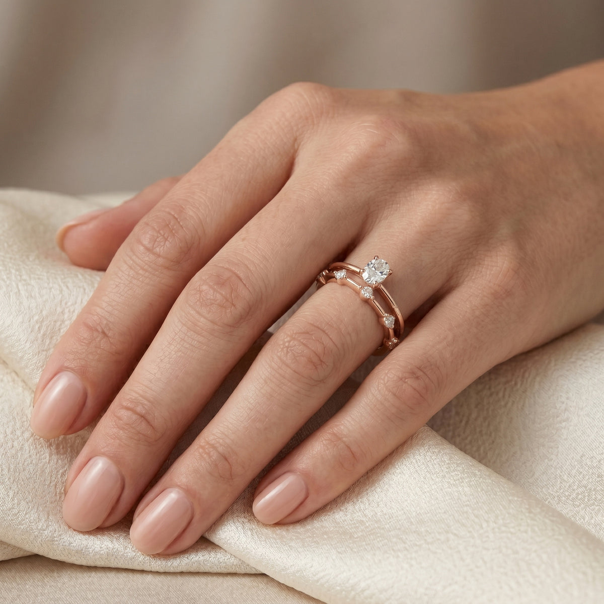 Oval Diamond Engagement Ring with Round Cluster Side Accents and Double Band — lifestyle