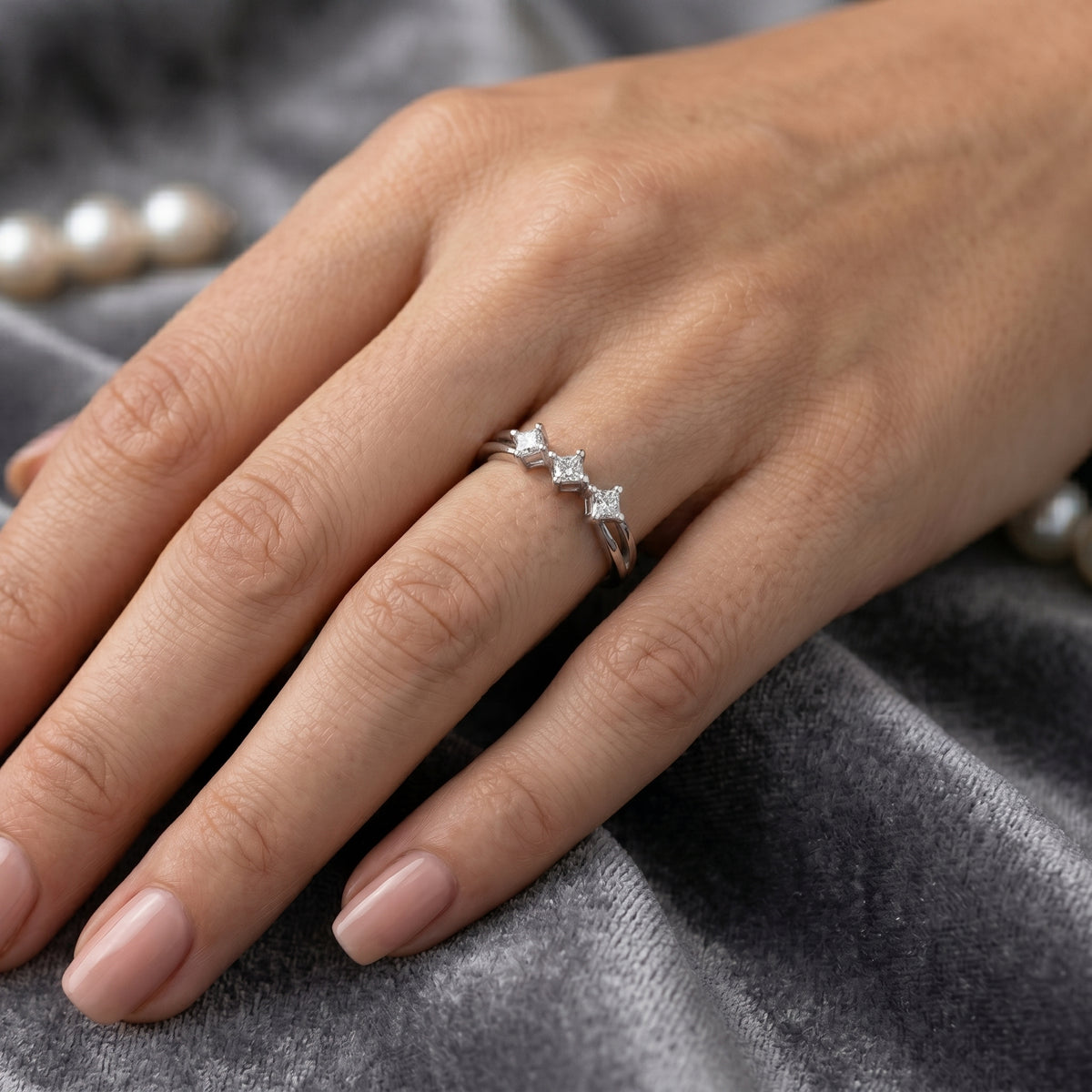 Princess Cut Three Stone Engagement Ring with Kite Orientation — lifestyle