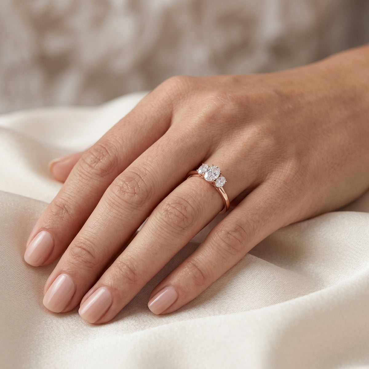 Oval Diamond Three Stone Engagement Ring with Oval Sides — lifestyle