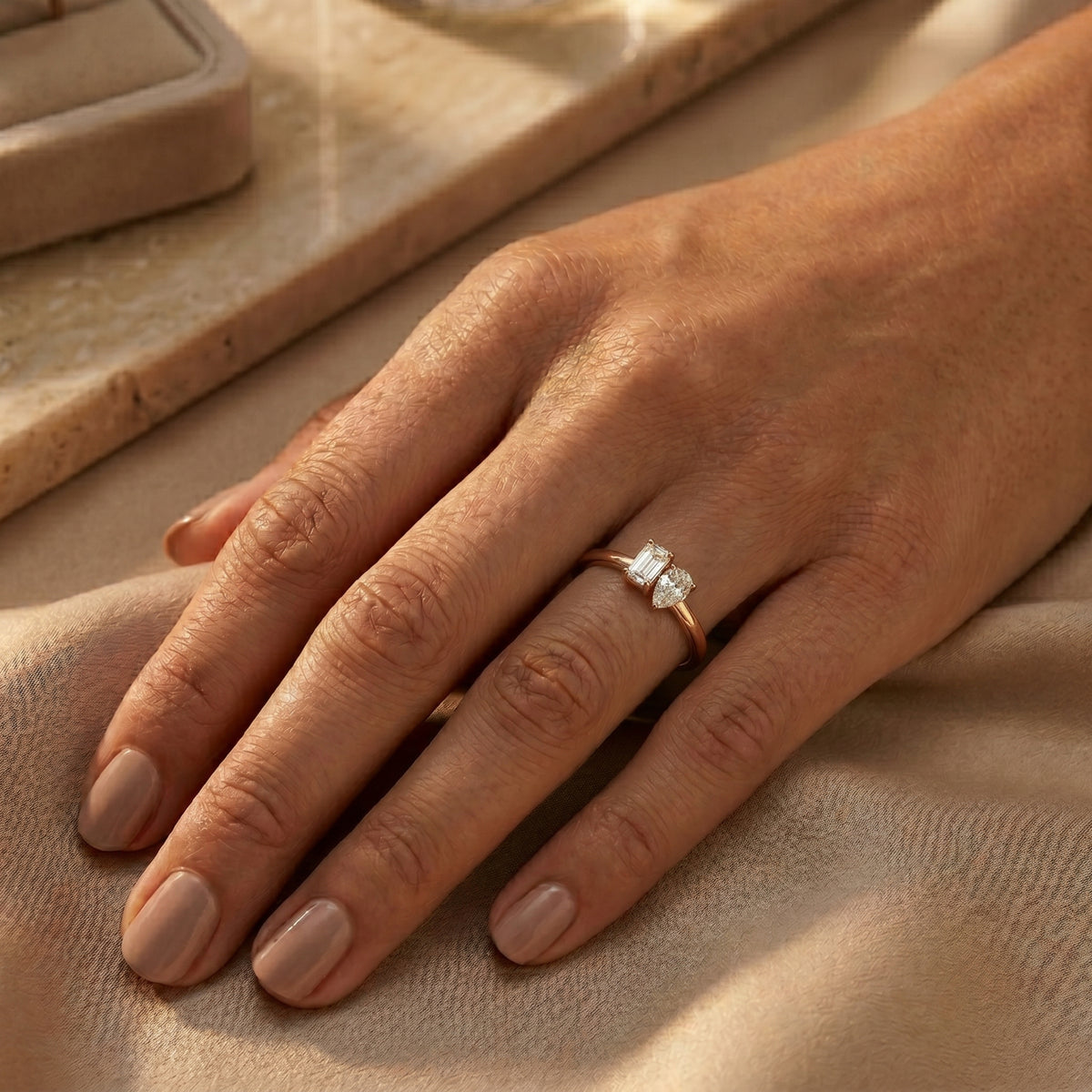 Emerald and Pear Toi et Moi Engagement Ring — lifestyle