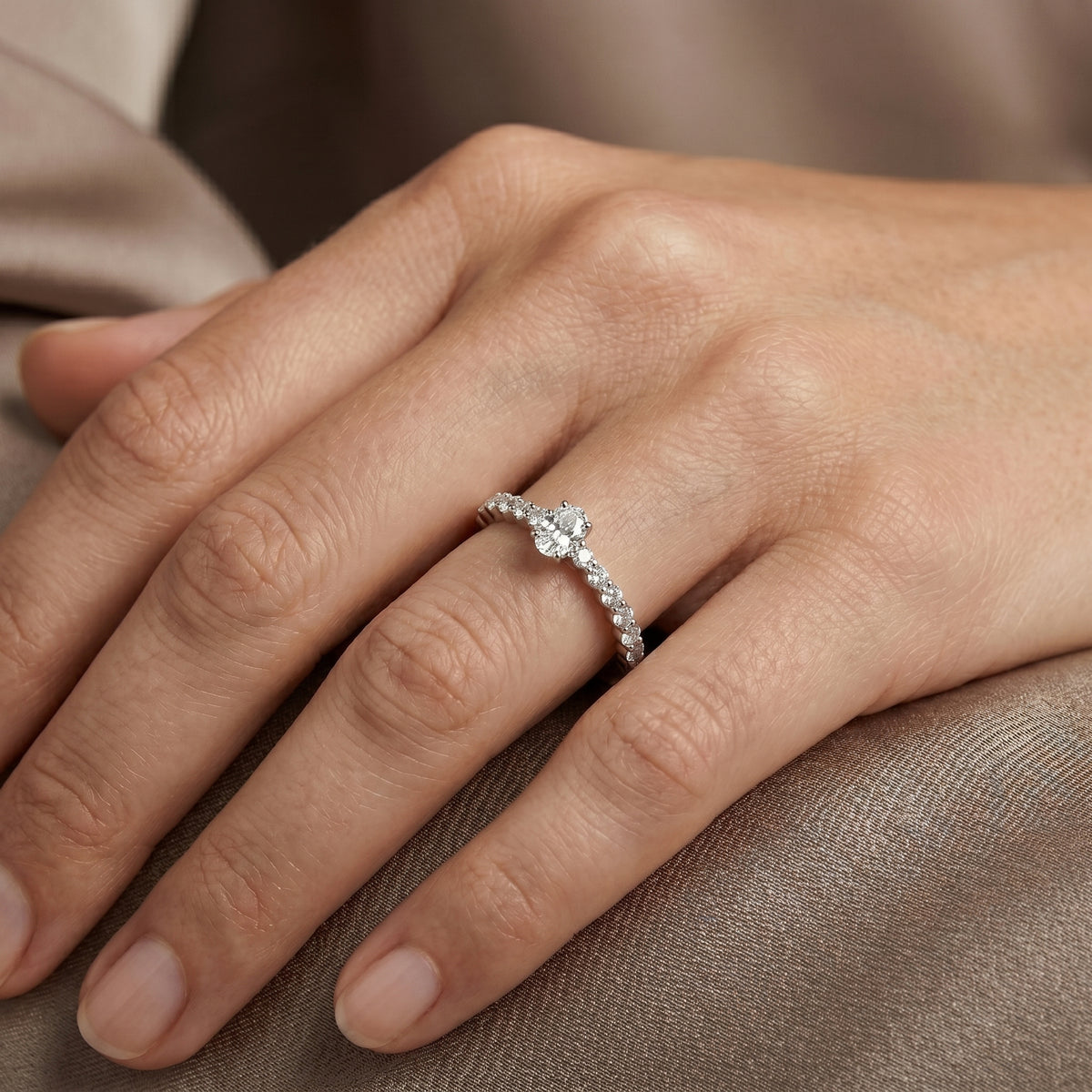 Oval Diamond Engagement Ring with Graduated Side Accents
