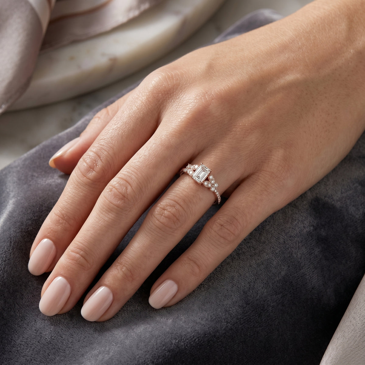 Emerald Cut Engagement Ring with Floral Side Cluster Accents