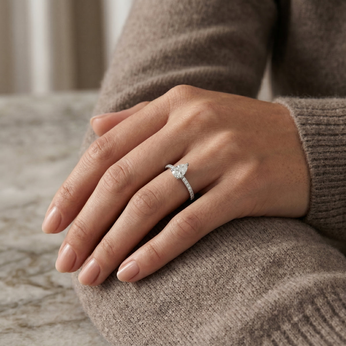 Pear Diamond Engagement Ring with Channel Set Pavé Band — lifestyle