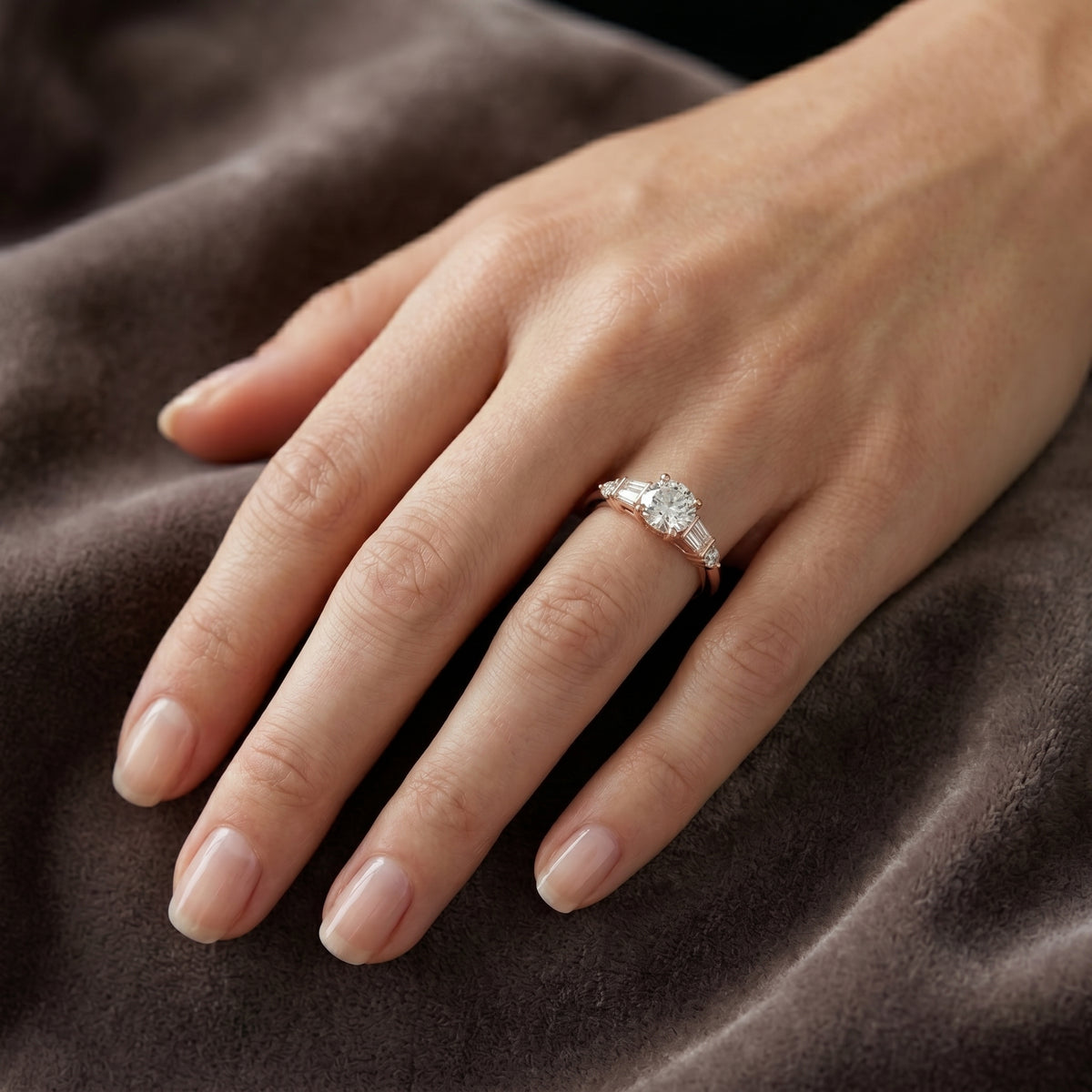 Round Diamond Engagement Ring with Tapered Baguette Side Accents — lifestyle