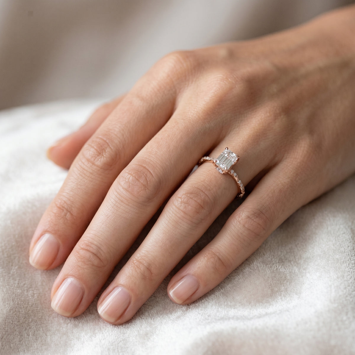 Emerald Cut Engagement Ring with Twisted Pavé Band — lifestyle