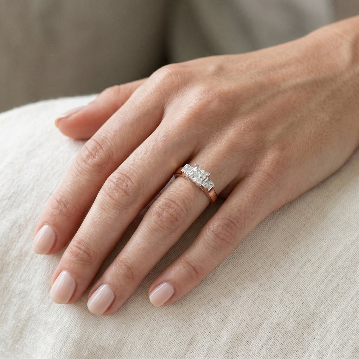 Princess Cut Three Stone Engagement Ring with Channel Set Band — lifestyle