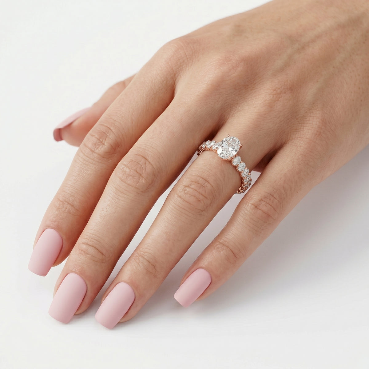Oval Diamond Engagement Ring with Oval Side Stone Halo Band — lifestyle