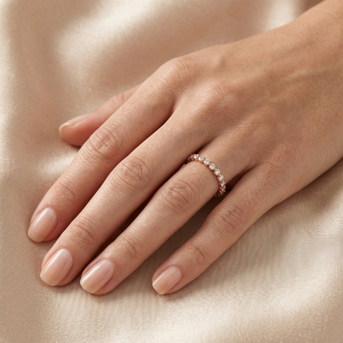 Round Diamond Shared Prong Eternity Band — lifestyle