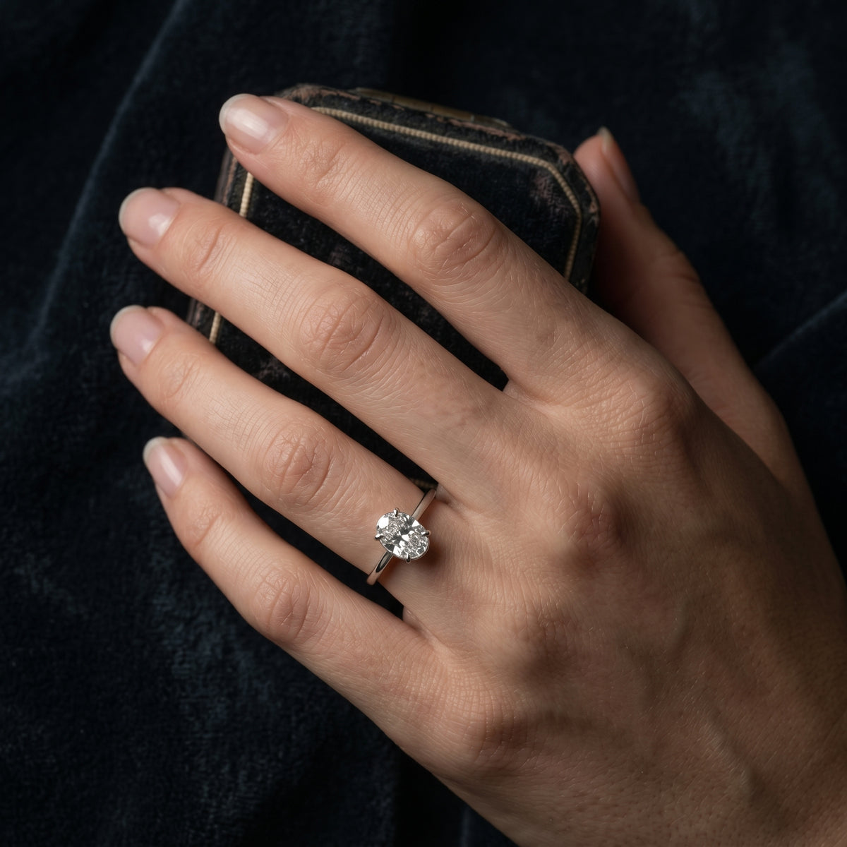 Oval Diamond Bezel Set Solitaire Engagement Ring — lifestyle