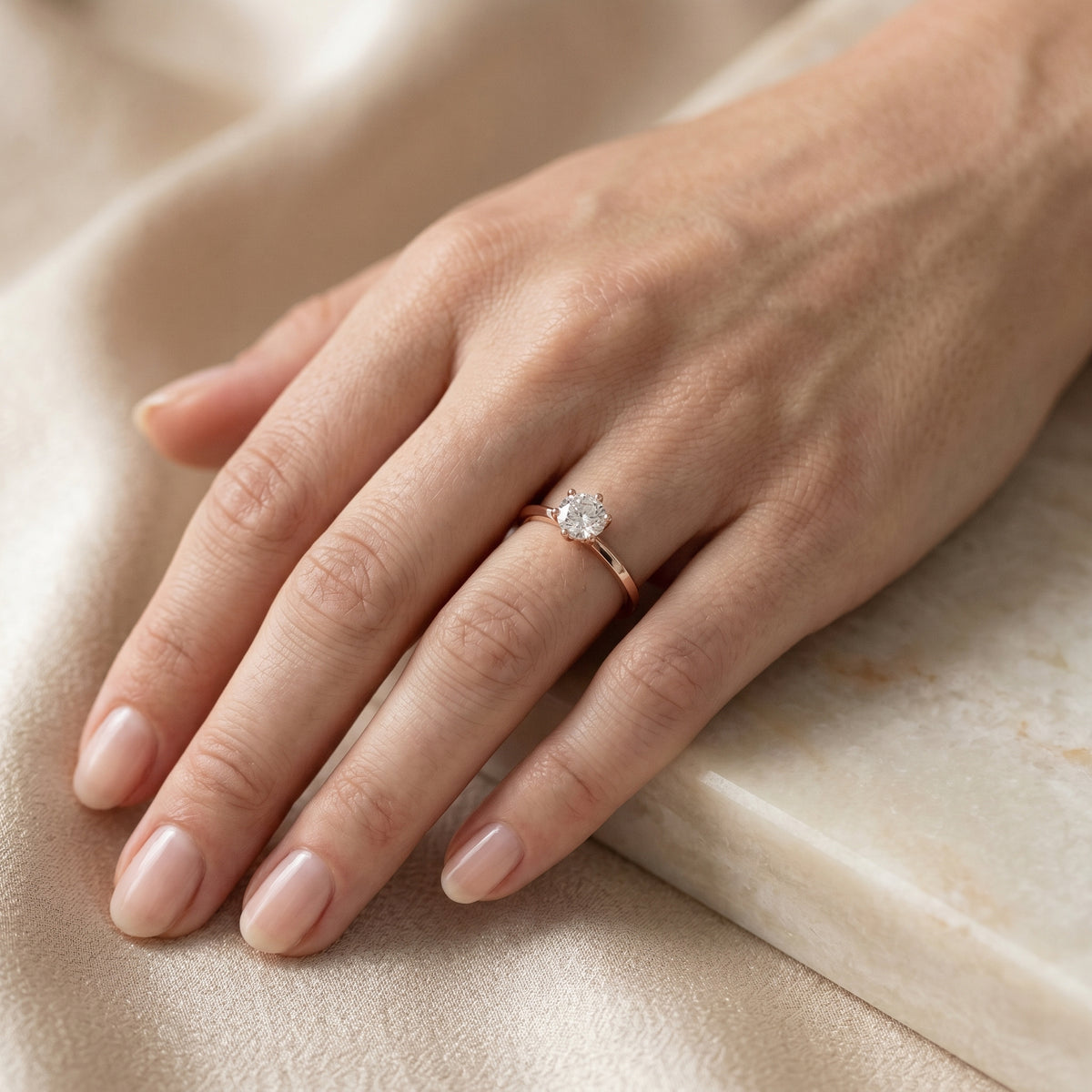 Round Diamond Six Prong Solitaire Engagement Ring with Knife Edge Band — lifestyle