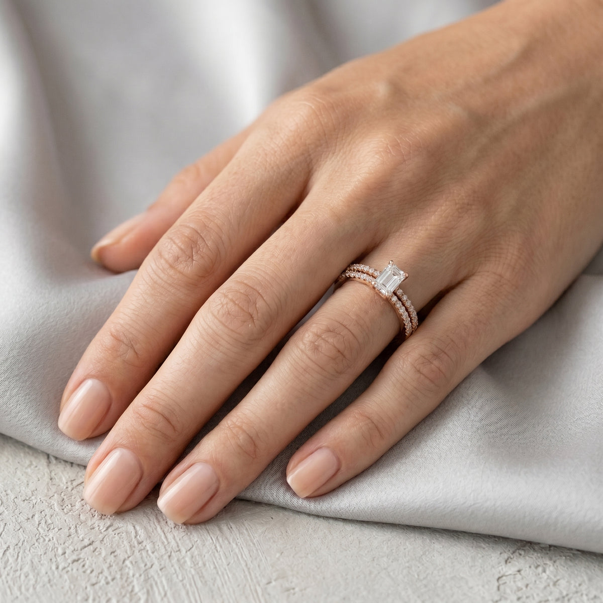 Emerald Cut Split Shank Engagement Ring with Pavé Band — lifestyle