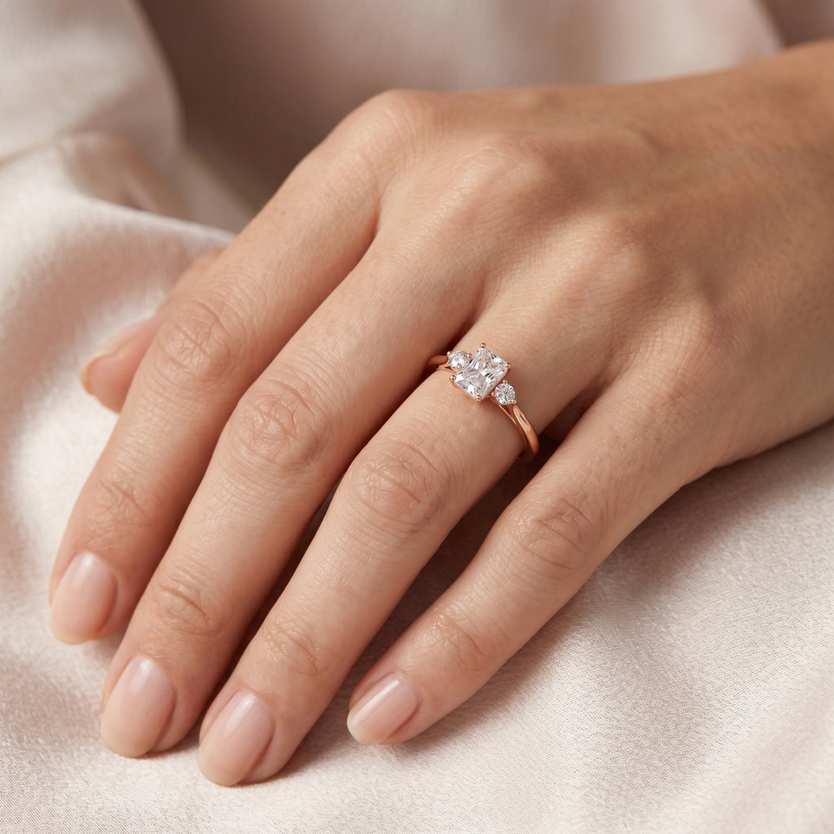 Emerald Cut Three Stone with Pear Shaped Diamonds — lifestyle
