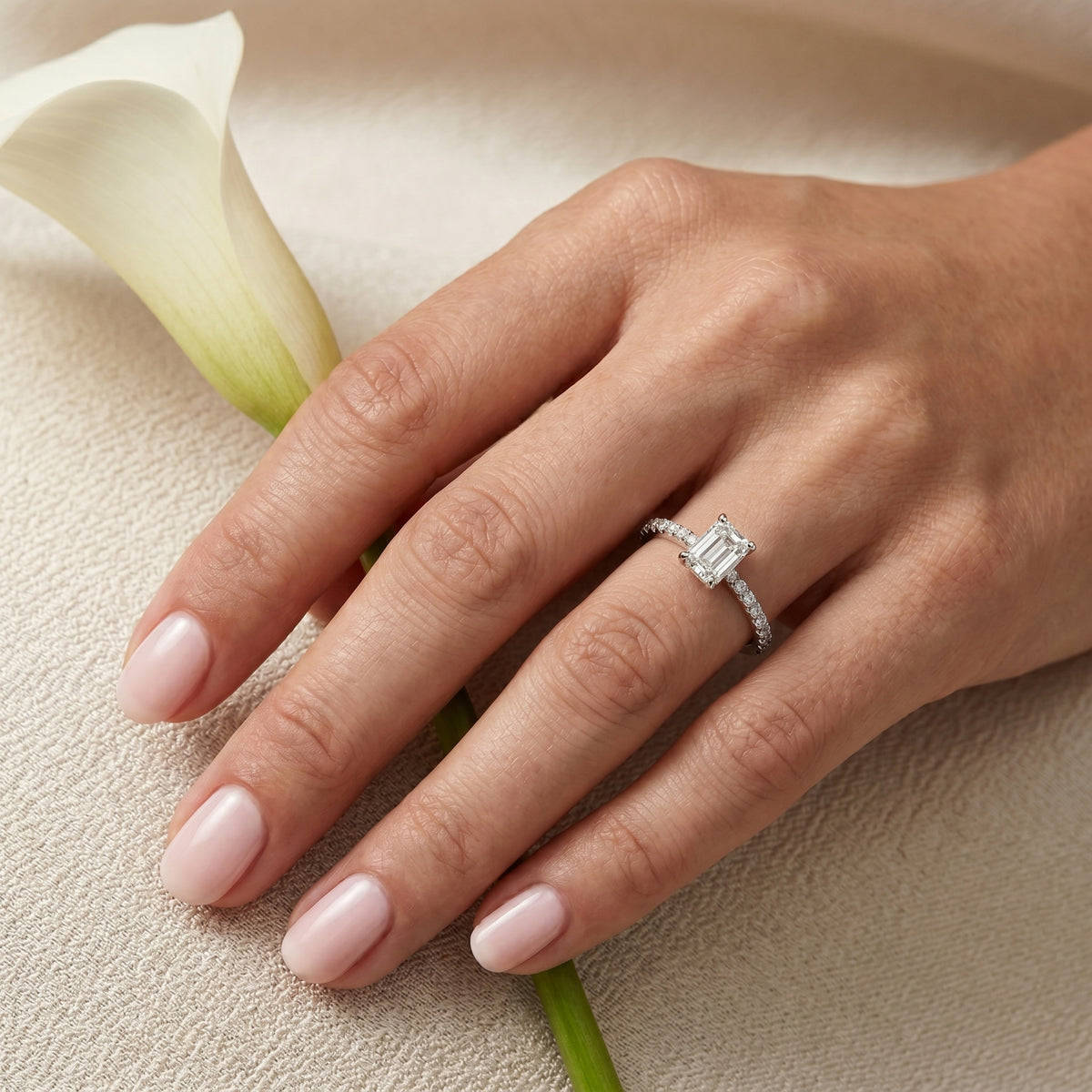 Emerald Cut Engagement Ring with Pavé Band — lifestyle
