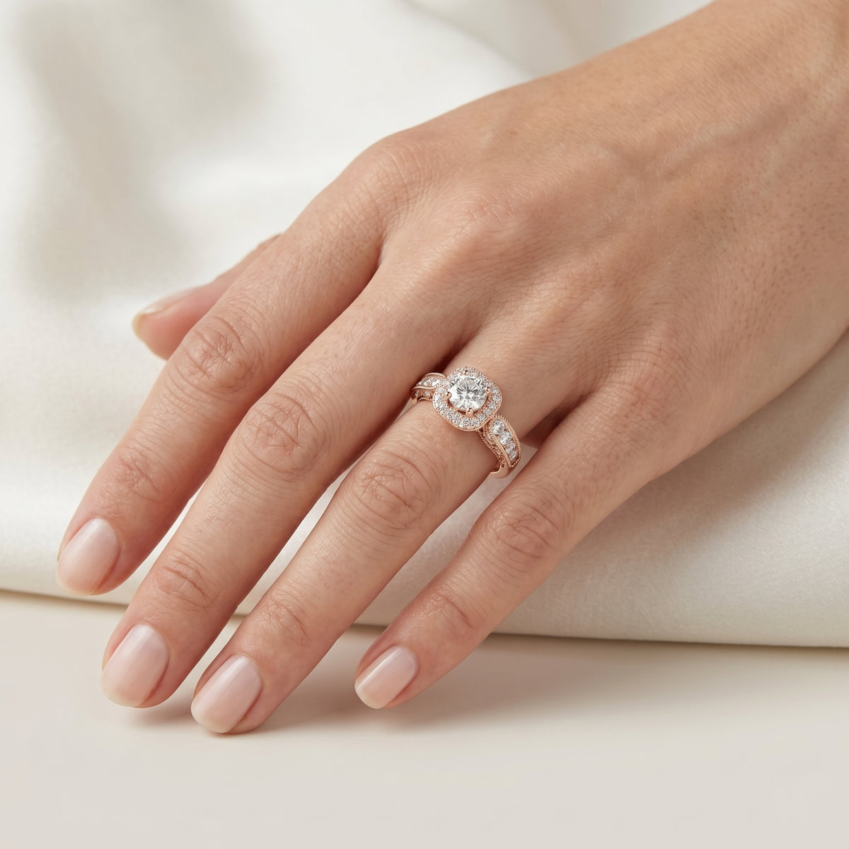 Round Diamond Cushion Halo Engagement Ring with Decorative Pavé Band — lifestyle
