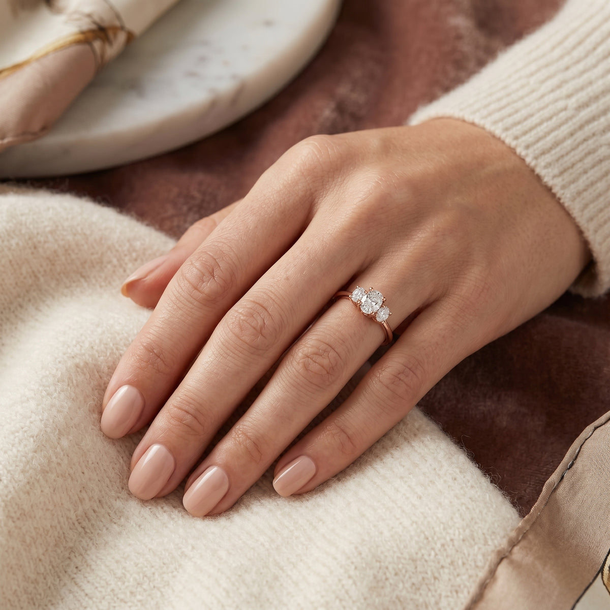 Pear Diamond Three Stone Engagement Ring with Round Sides — lifestyle