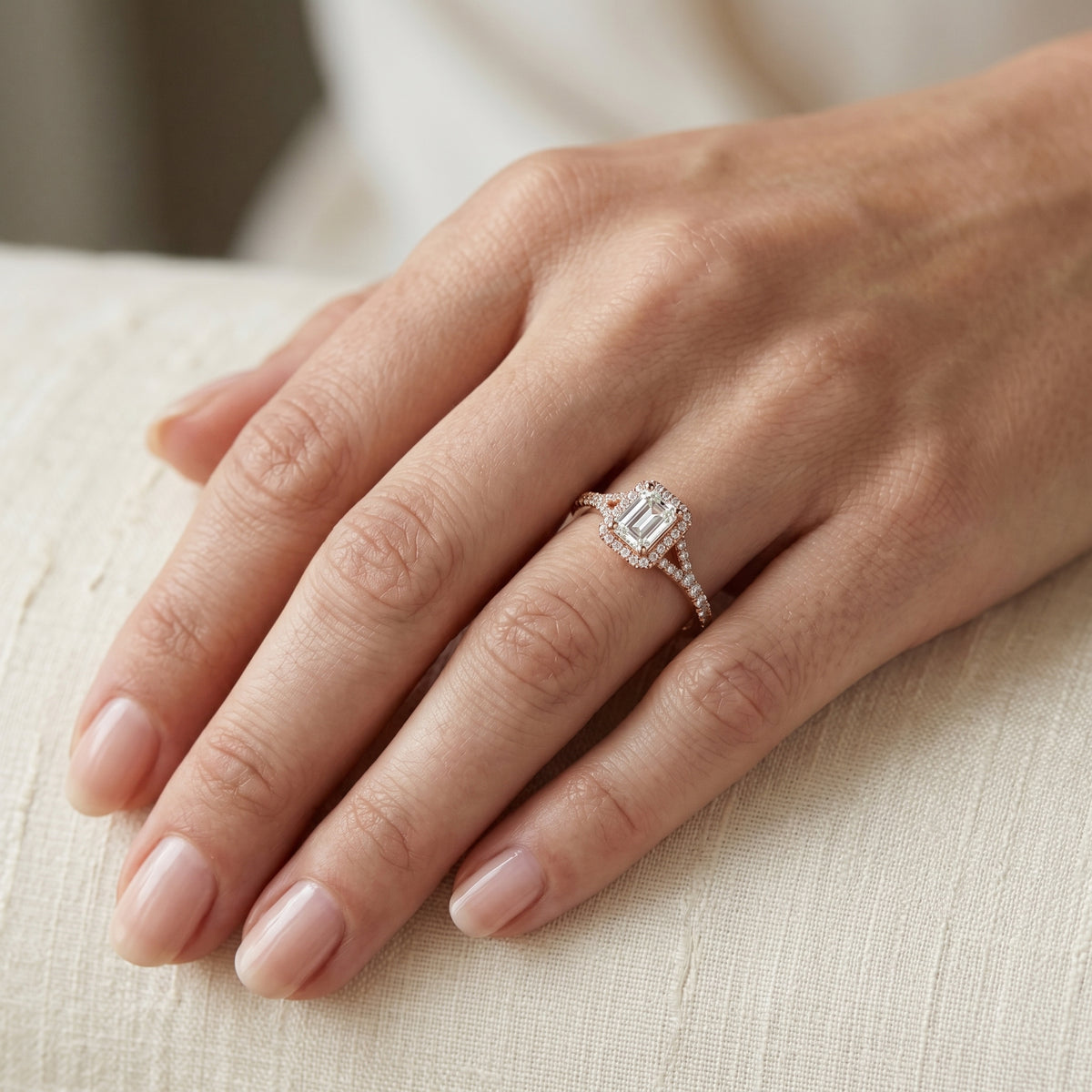 Emerald Cut Halo Engagement Ring with Split Shank Pavé Band — lifestyle