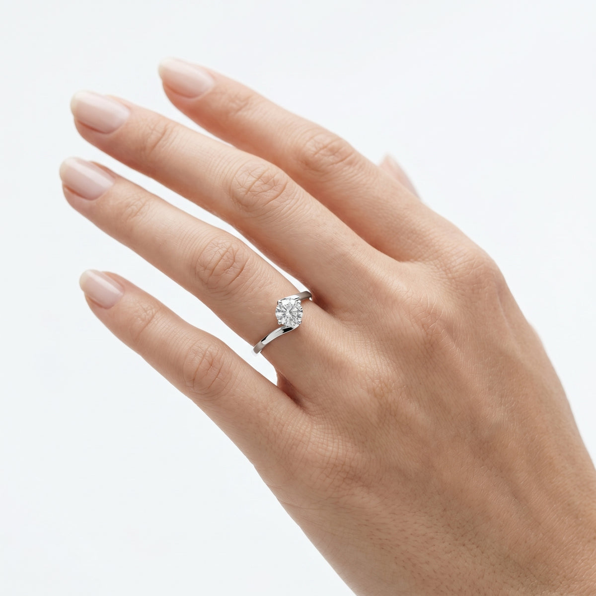 Round Diamond Bypass Solitaire Engagement Ring with Crossover Shank — lifestyle