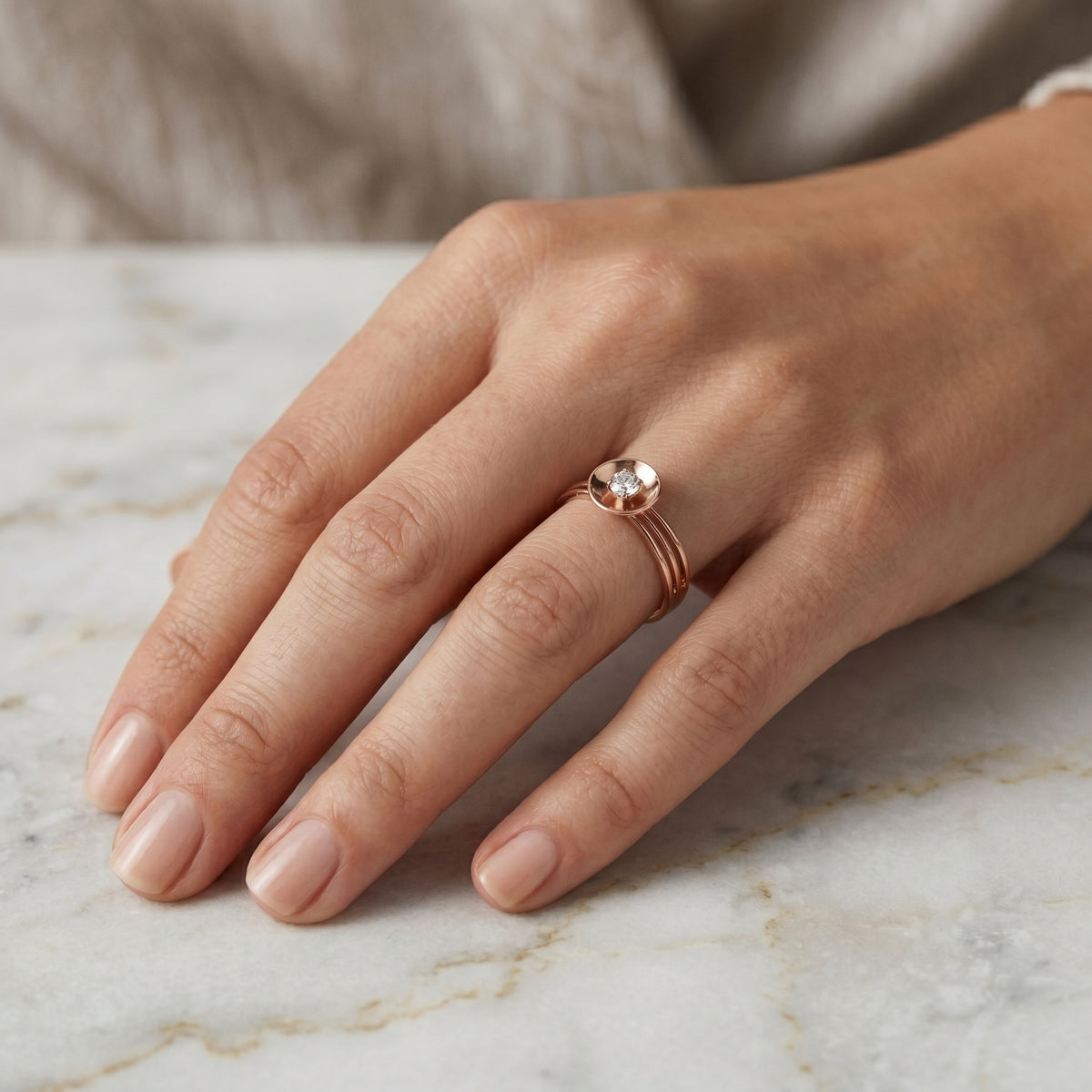 Round Diamond Solitaire Engagement Ring with Oval Bezel Frame — lifestyle