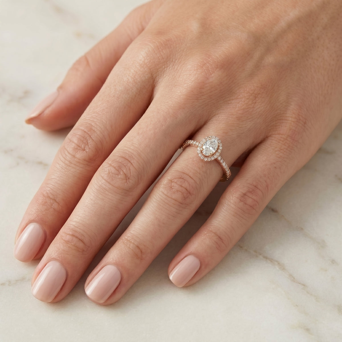Oval Diamond Halo Engagement Ring with Double Row Pavé Band — lifestyle