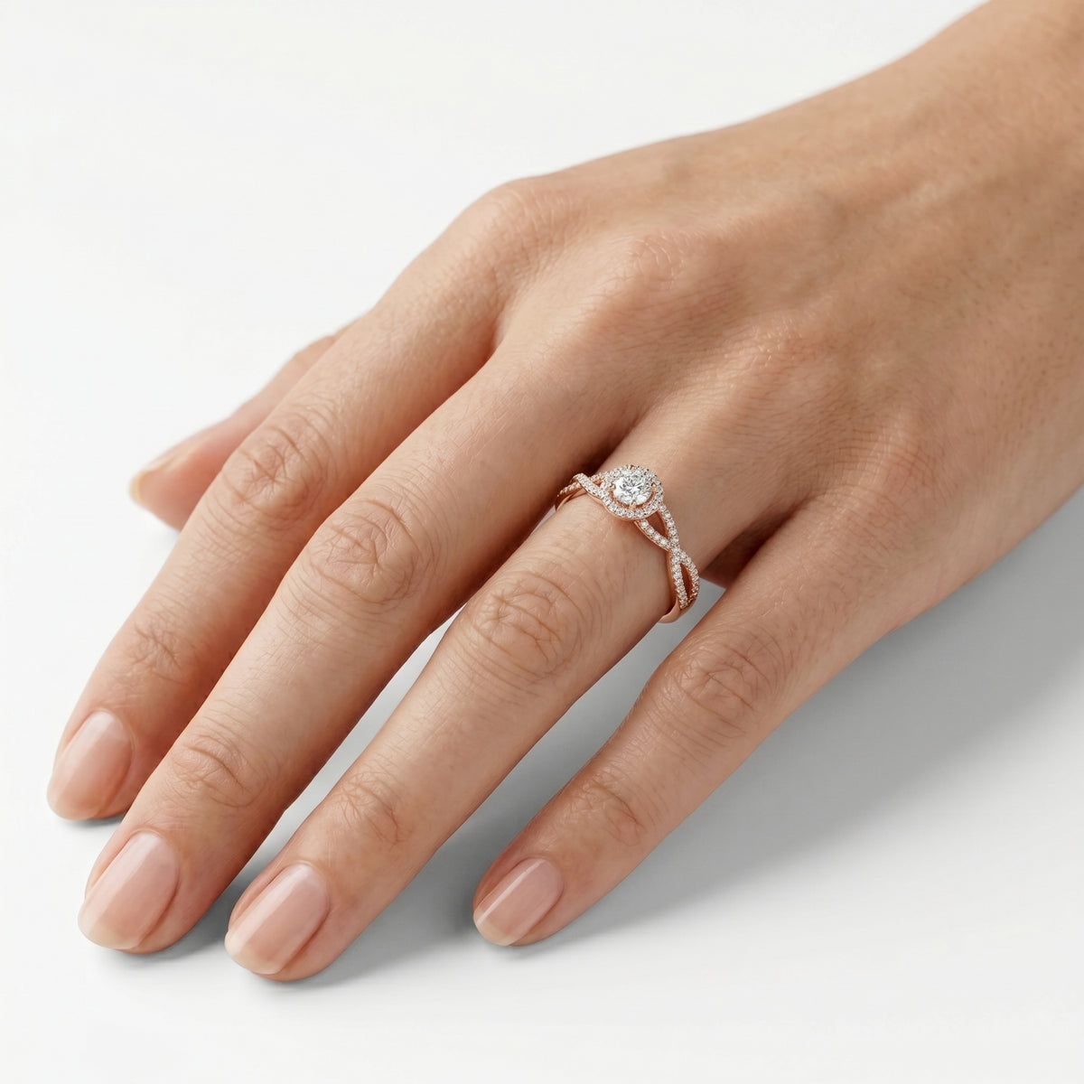 Round Diamond Halo Engagement Ring with Twisted Infinity Pavé Band — lifestyle