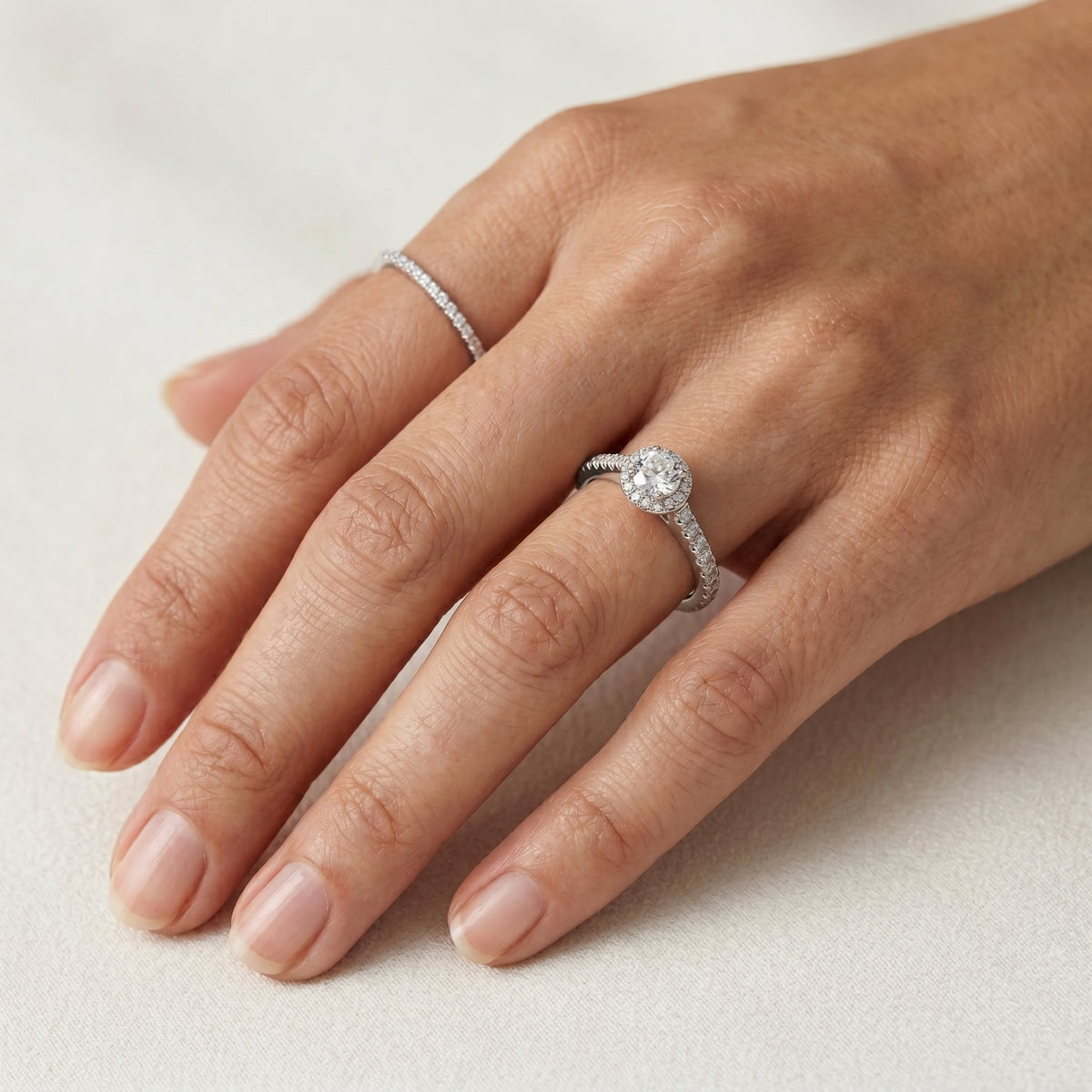 Round Diamond Halo Engagement Ring with Pavé Band — lifestyle