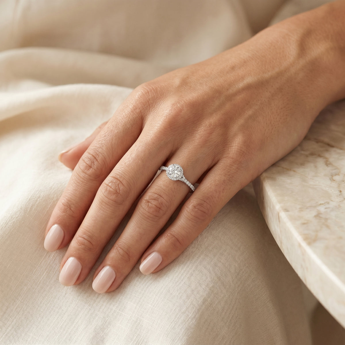 Round Diamond Halo Engagement Ring with Knife Edge Pavé Band — lifestyle
