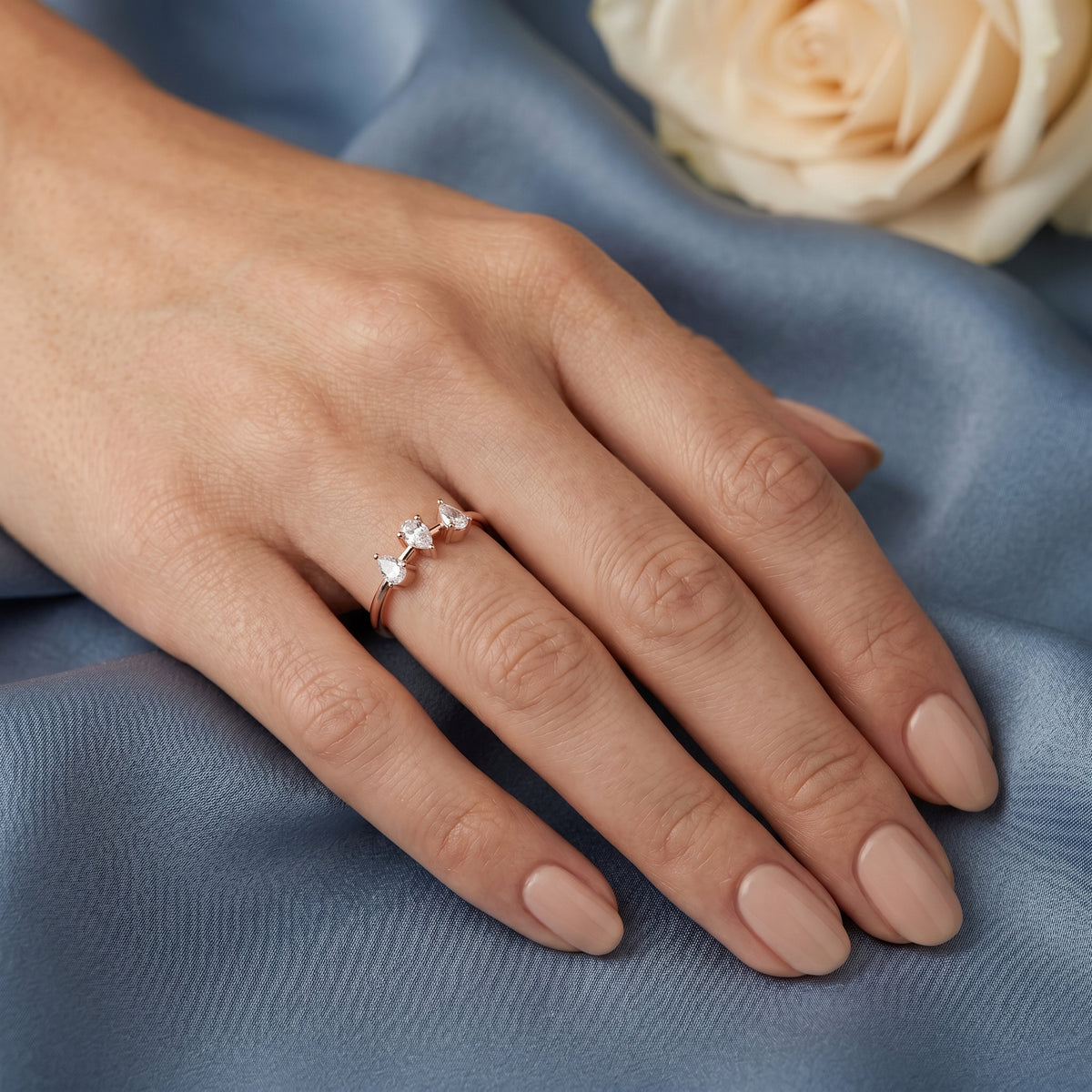 Pear Three Stone Diamond Engagement Ring — lifestyle