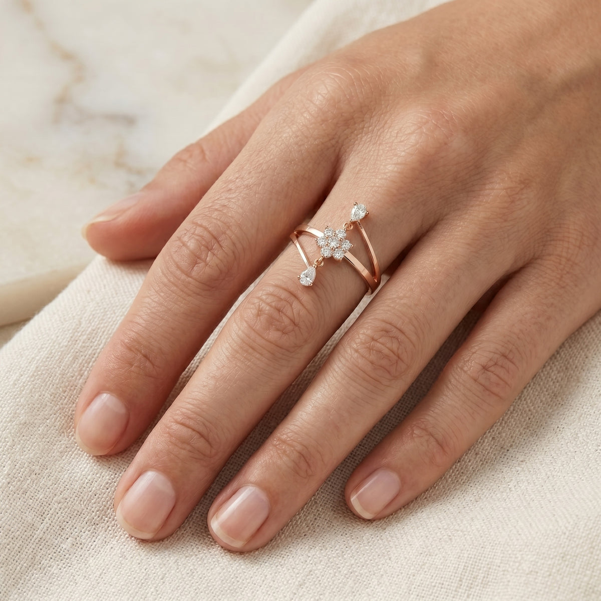 Round and Pear Constellation Engagement Ring with Bypass Shank — lifestyle