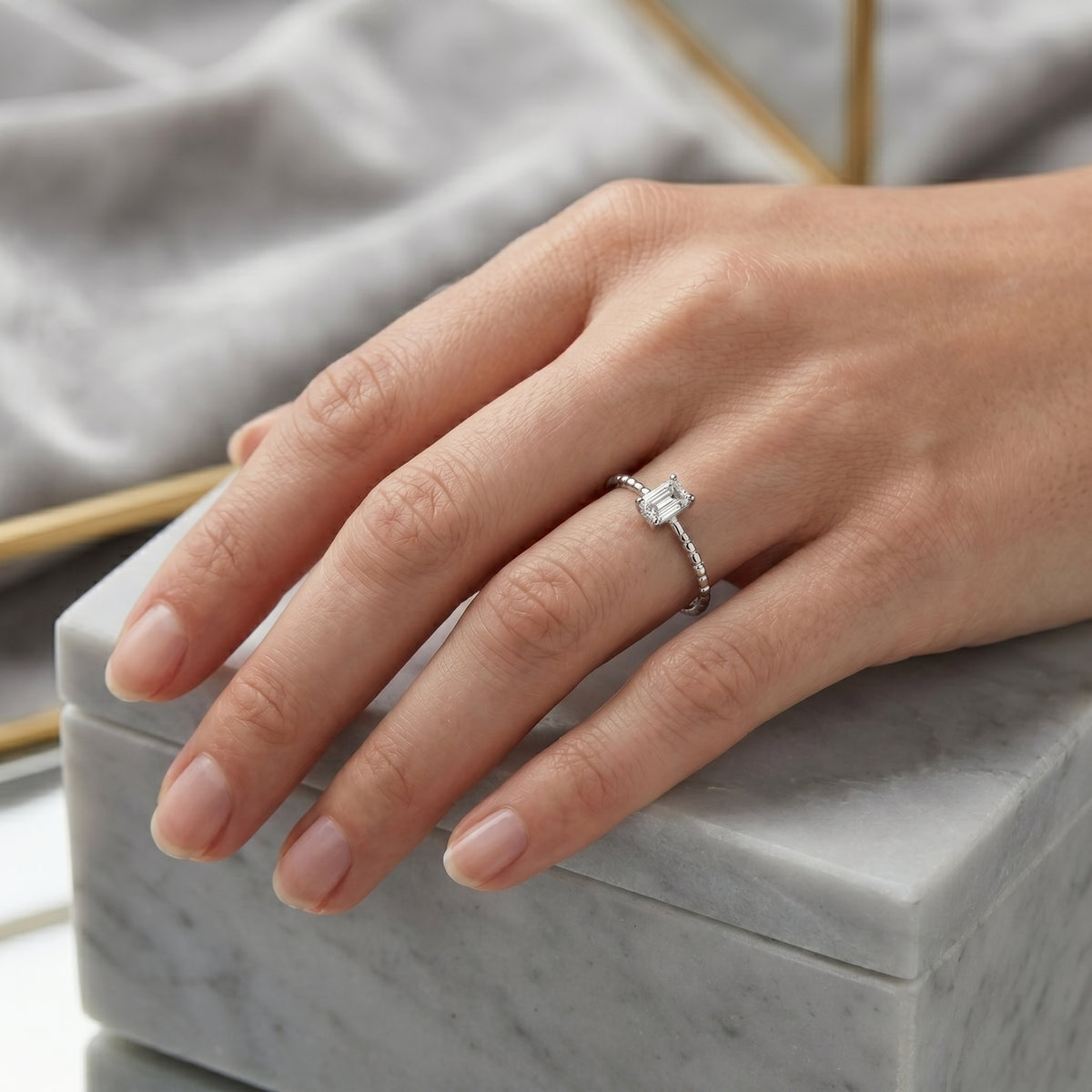 Petite Emerald Cut Solitaire Engagement Ring