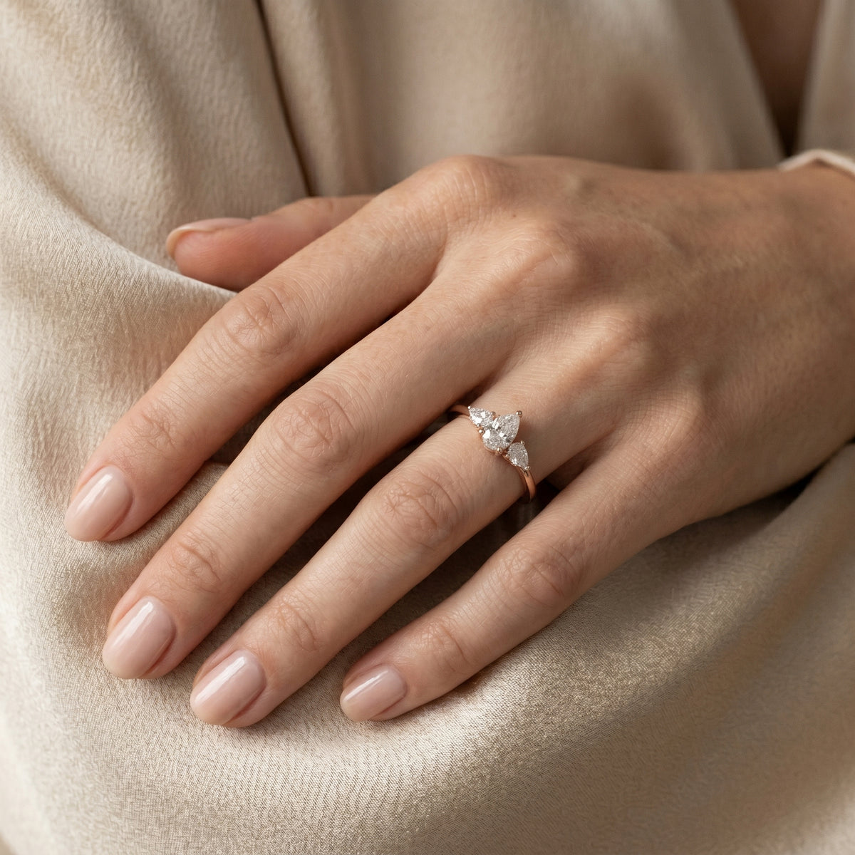 Pear Diamond Three Stone Engagement Ring with Pear Sides — lifestyle