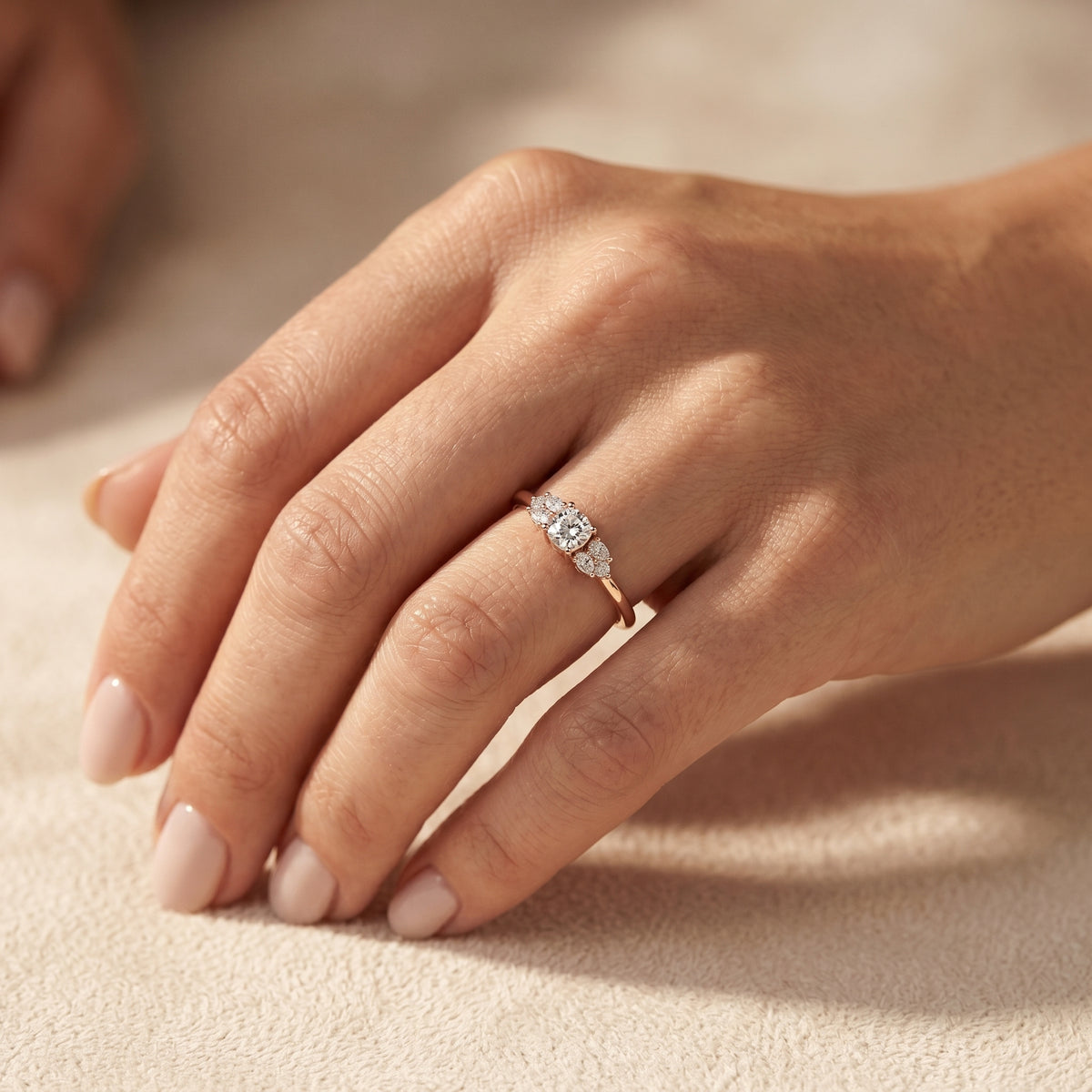 Cushion Cut Engagement Ring with Pear and Round Side Stone Accents — lifestyle