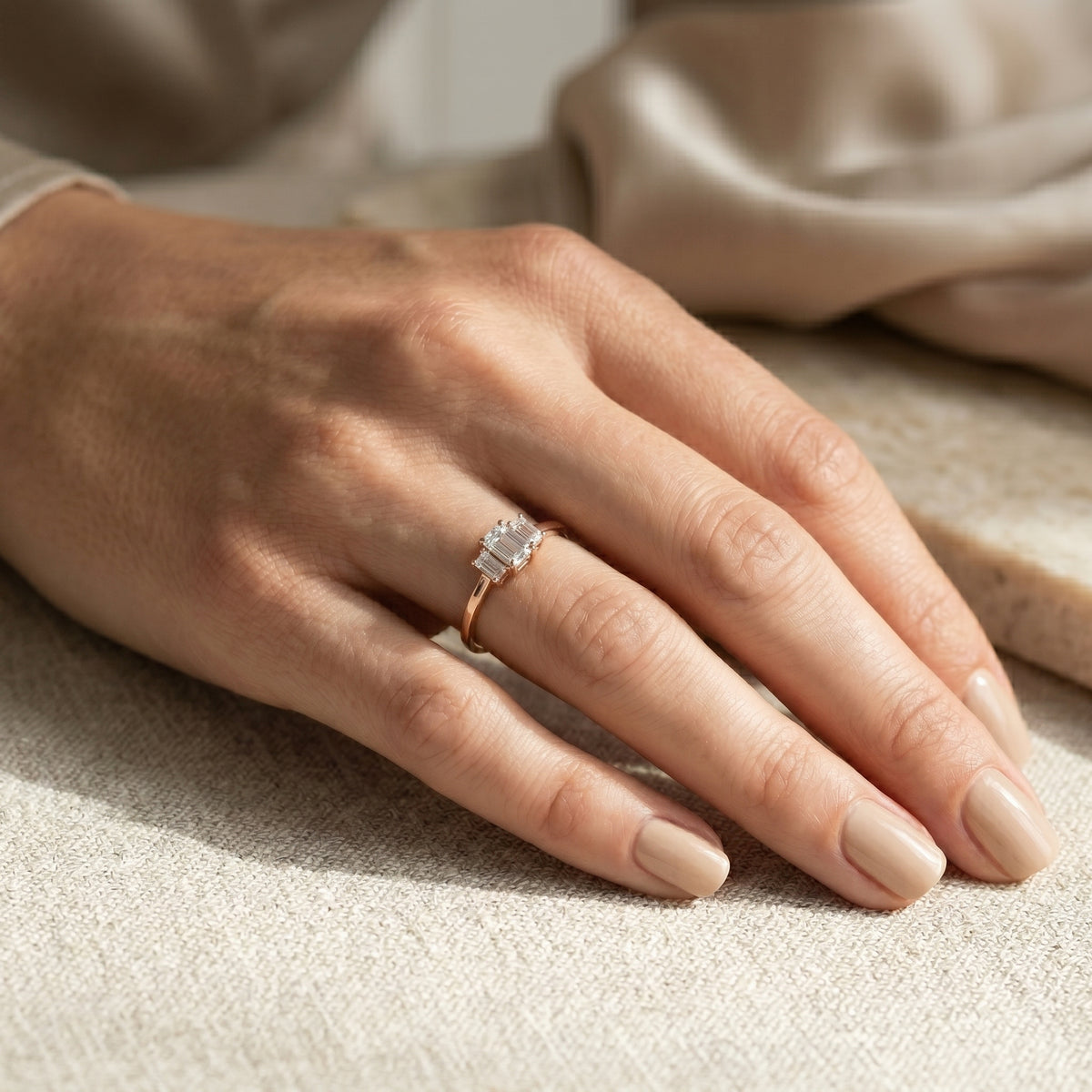 Emerald Cut Three Stone Engagement Ring — lifestyle