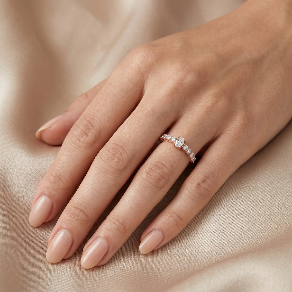 Oval Diamond Engagement Ring with Round Side Accents — lifestyle