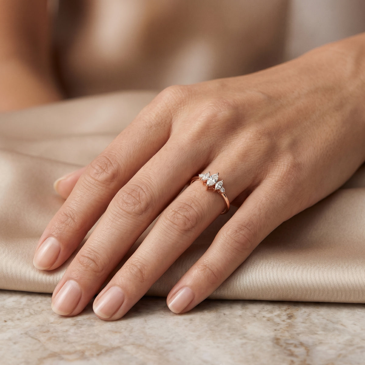 Marquise Trilogy with Round Side Stone Diamond Engagement Ring — lifestyle