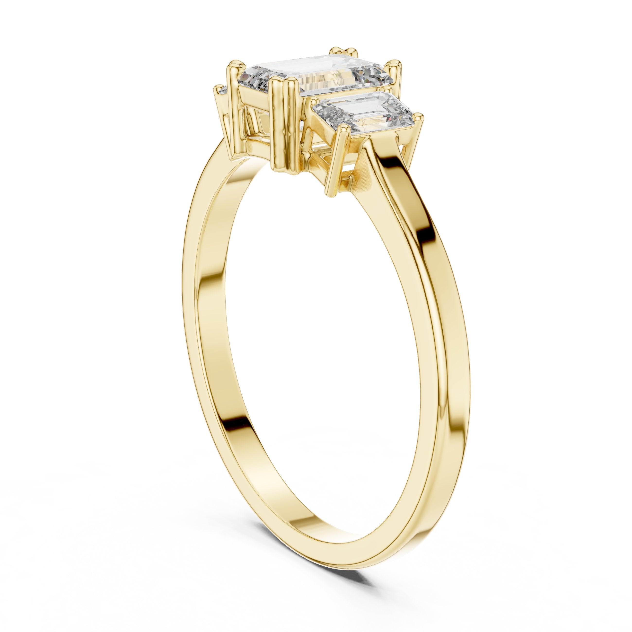 Emerald Cut Three Stone Engagement Ring in Yellow Gold - VYKA Diamonds