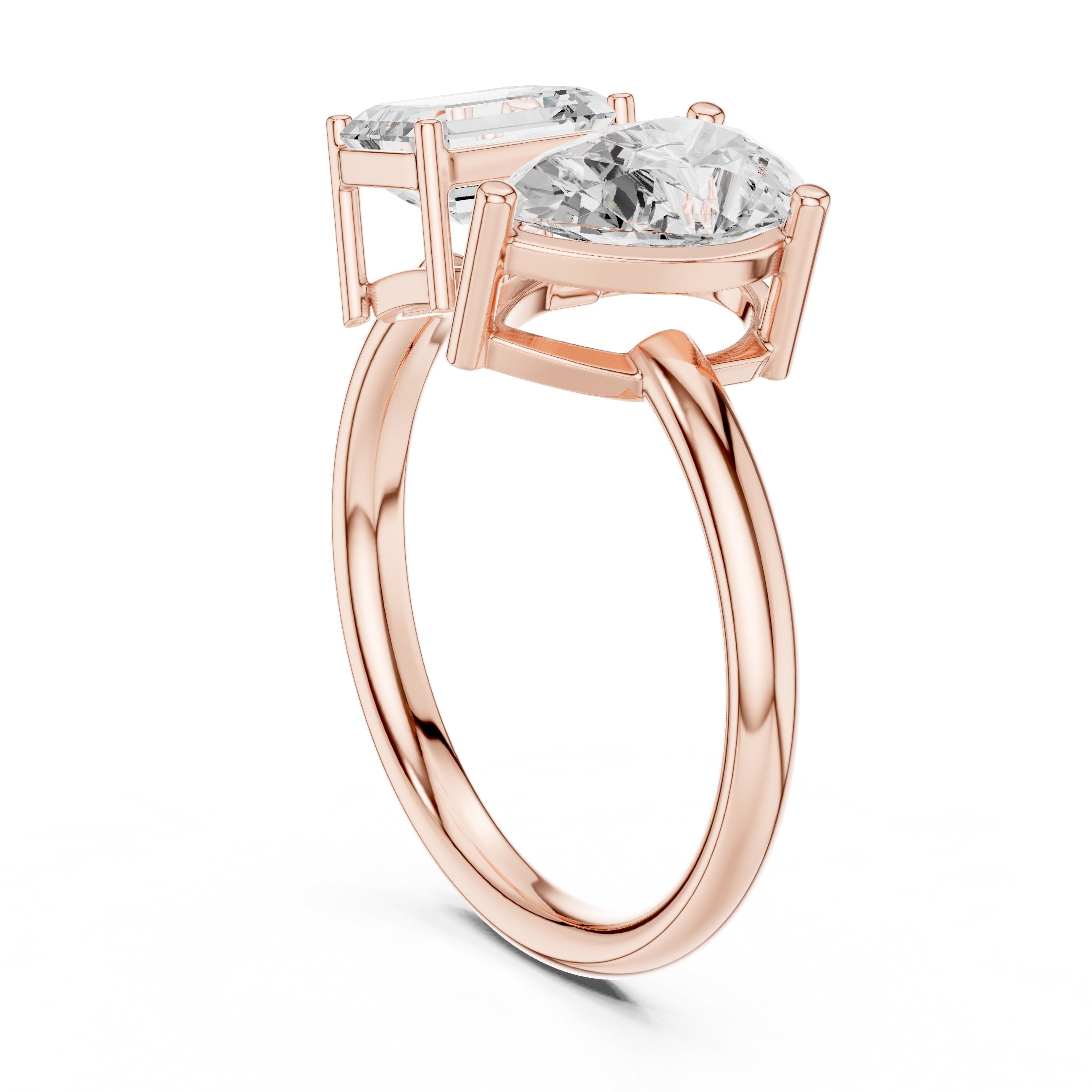 Emerald and Pear Toi et Moi Engagement Ring in Rose Gold - VYKA Diamonds