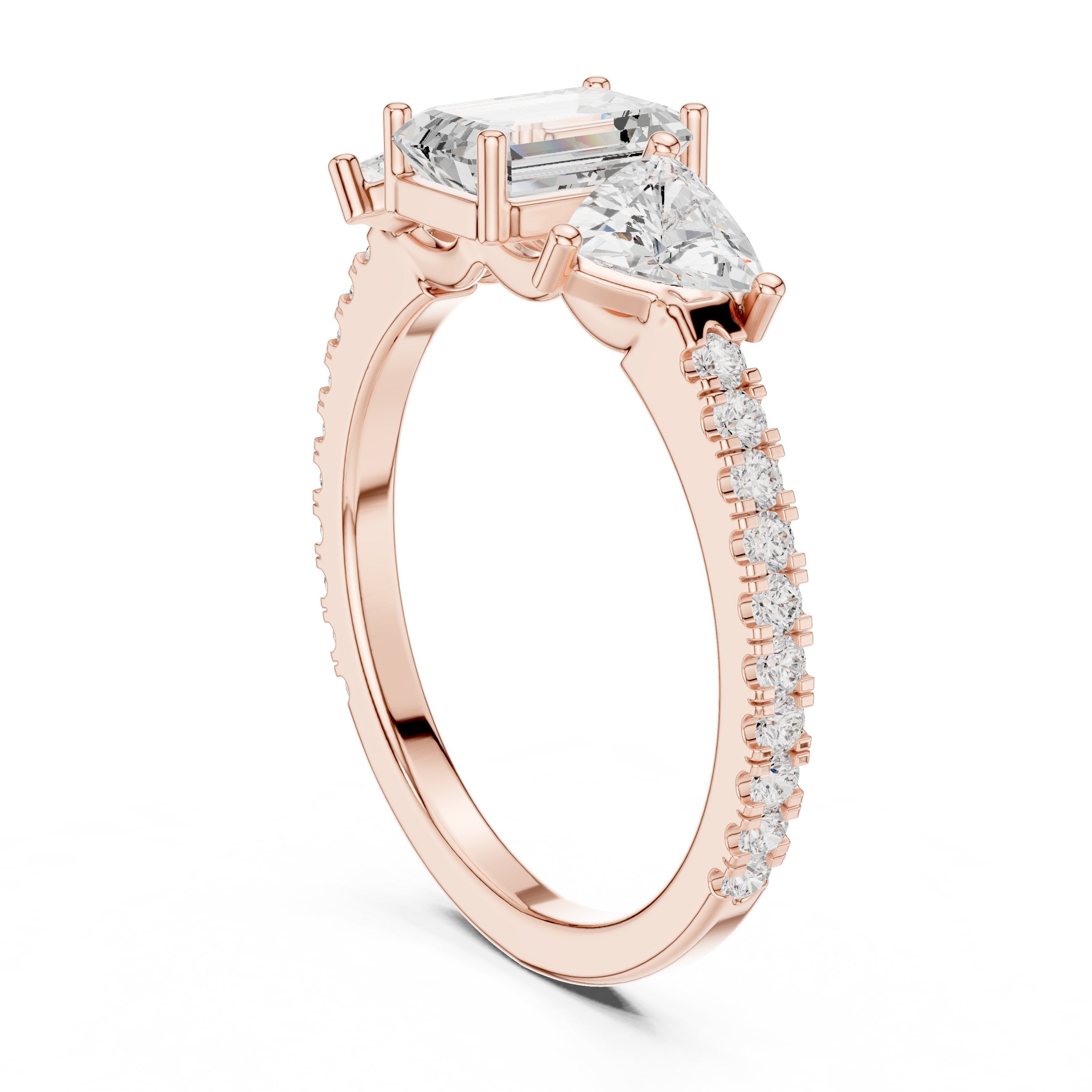 Emerald Cut Three Stone Engagement Ring with Trillion Sides and Pavé Band in Rose Gold - VYKA Diamonds