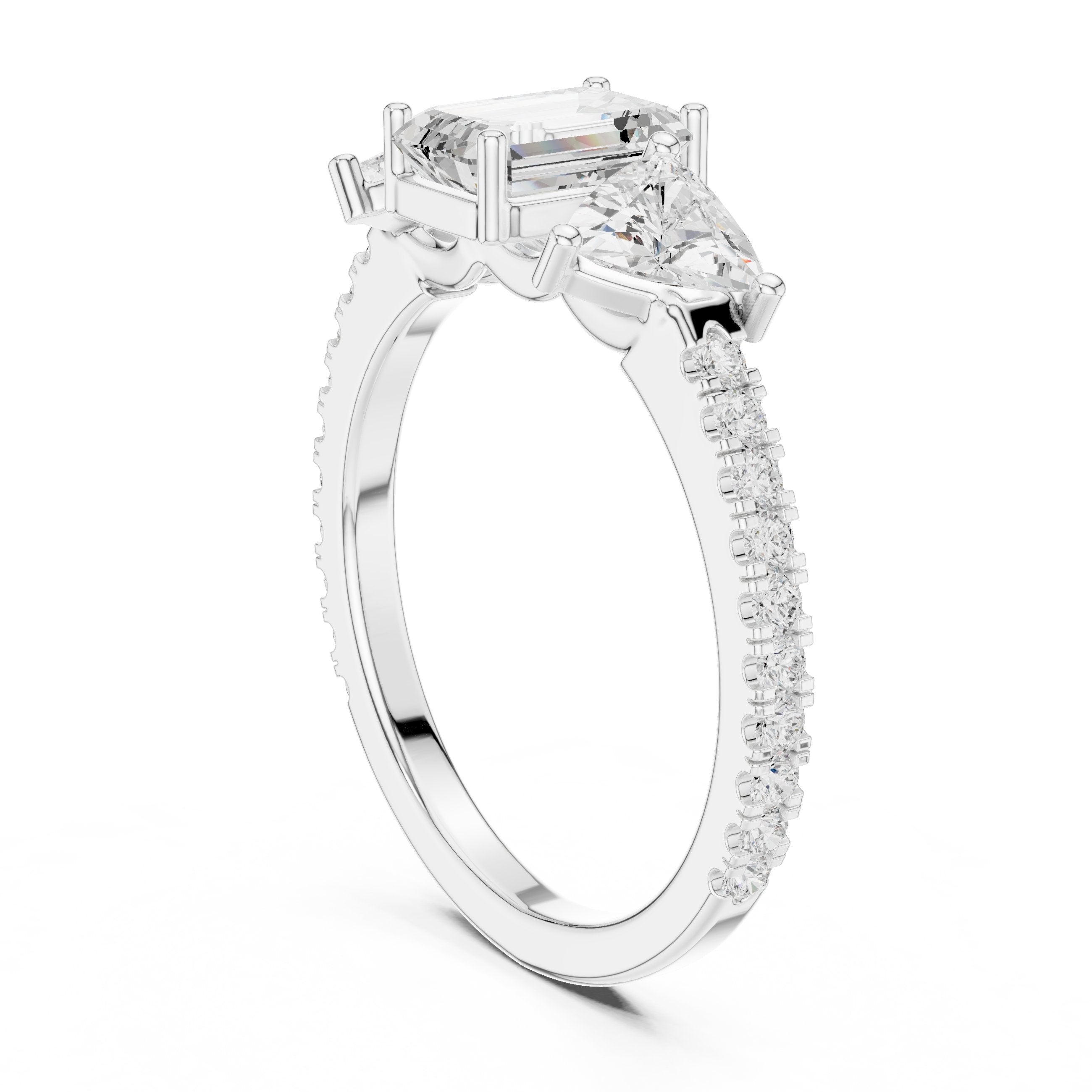 Emerald Cut Three Stone Engagement Ring with Trillion Sides and Pavé Band in White Gold - VYKA Diamonds