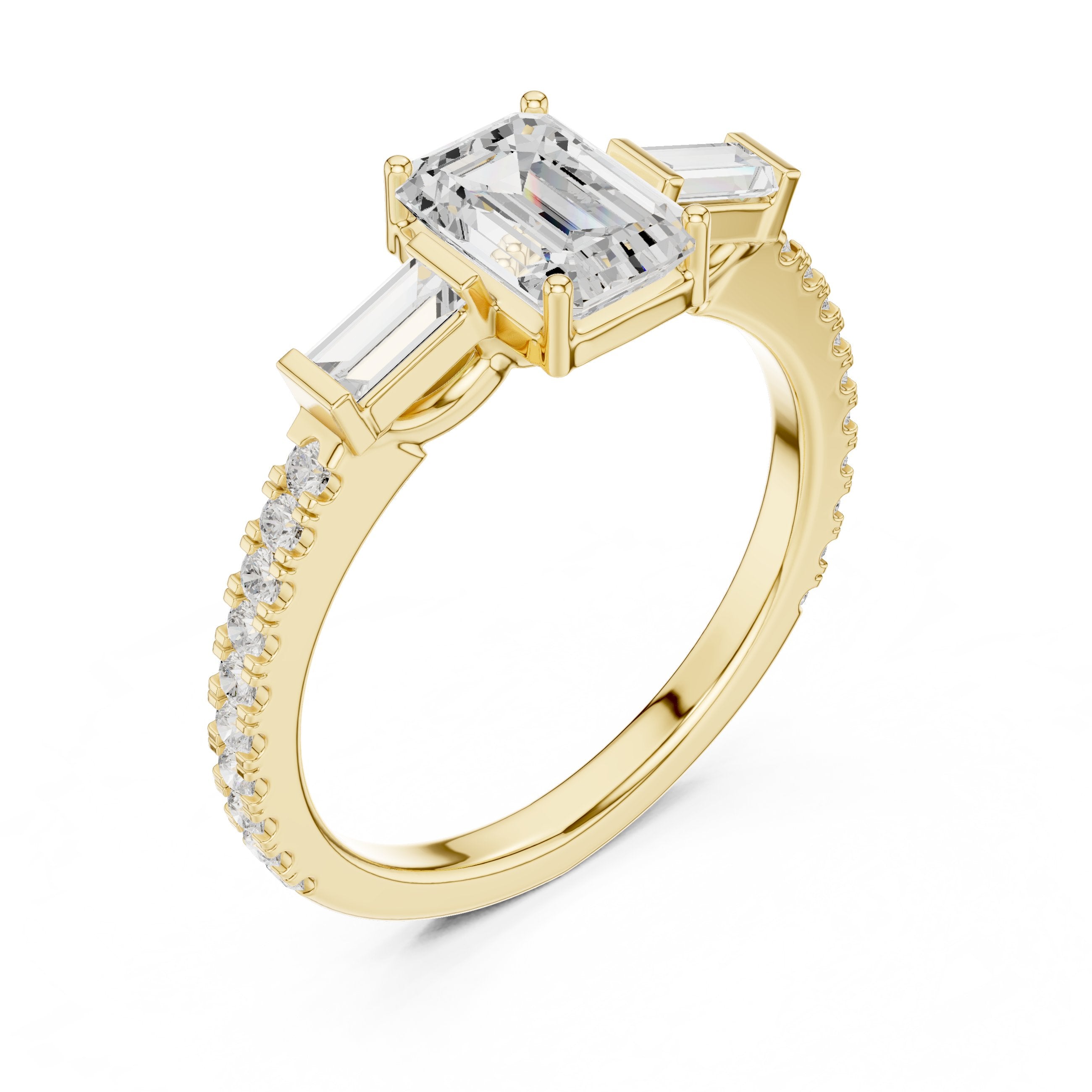 Emerald Cut Three Stone Engagement Ring with Baguette Sides and Pavé Band in Yellow Gold - VYKA Diamonds