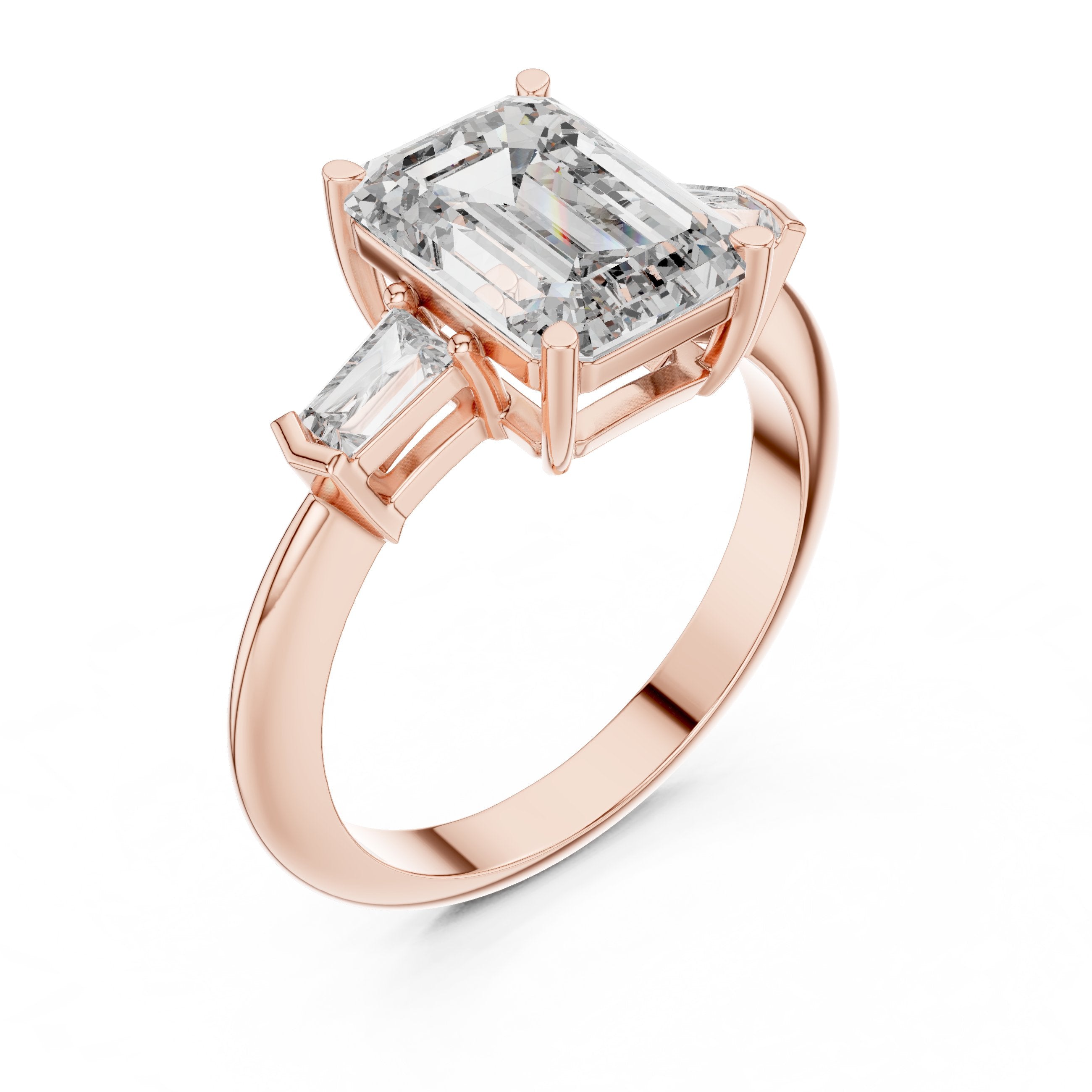 Emerald Cut Three Stone Engagement Ring with Tapered Baguette Sides in Rose Gold - VYKA Diamonds
