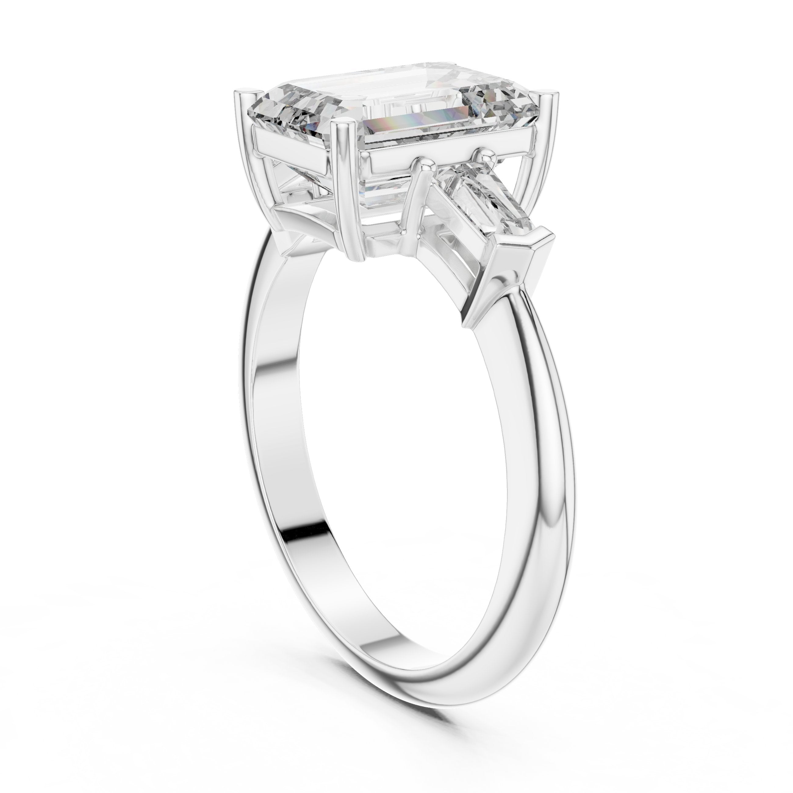Emerald Cut Three Stone Engagement Ring with Tapered Baguette Sides in White Gold - VYKA Diamonds